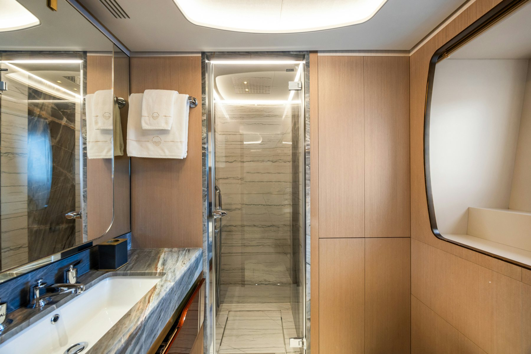 a bathroom with a shower unit aboard BELLA VITA Yacht for Sale