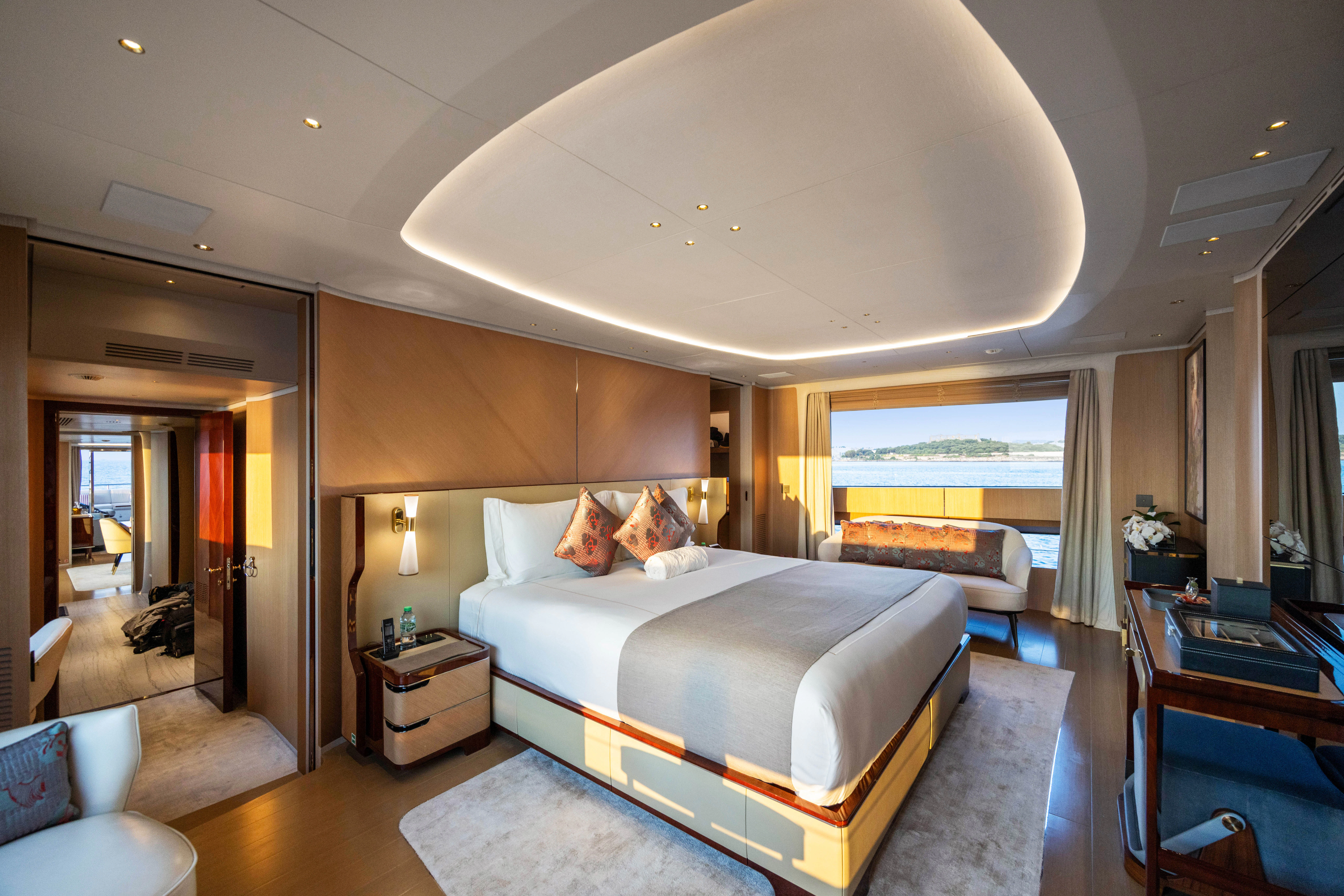 a large bedroom with a large bed aboard TRAMONTO Yacht for Charter