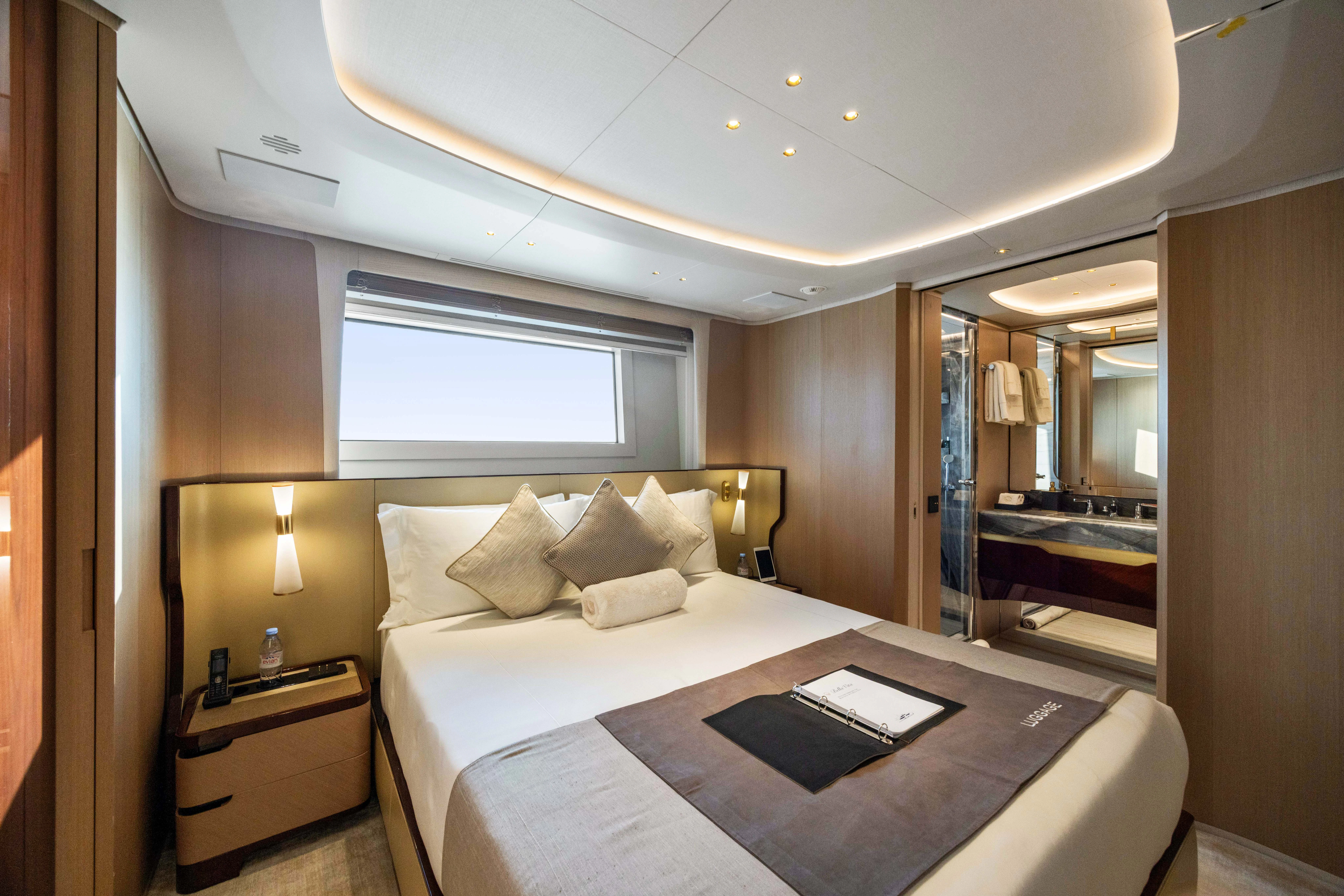 a hotel room with a bed aboard TRAMONTO Yacht for Charter