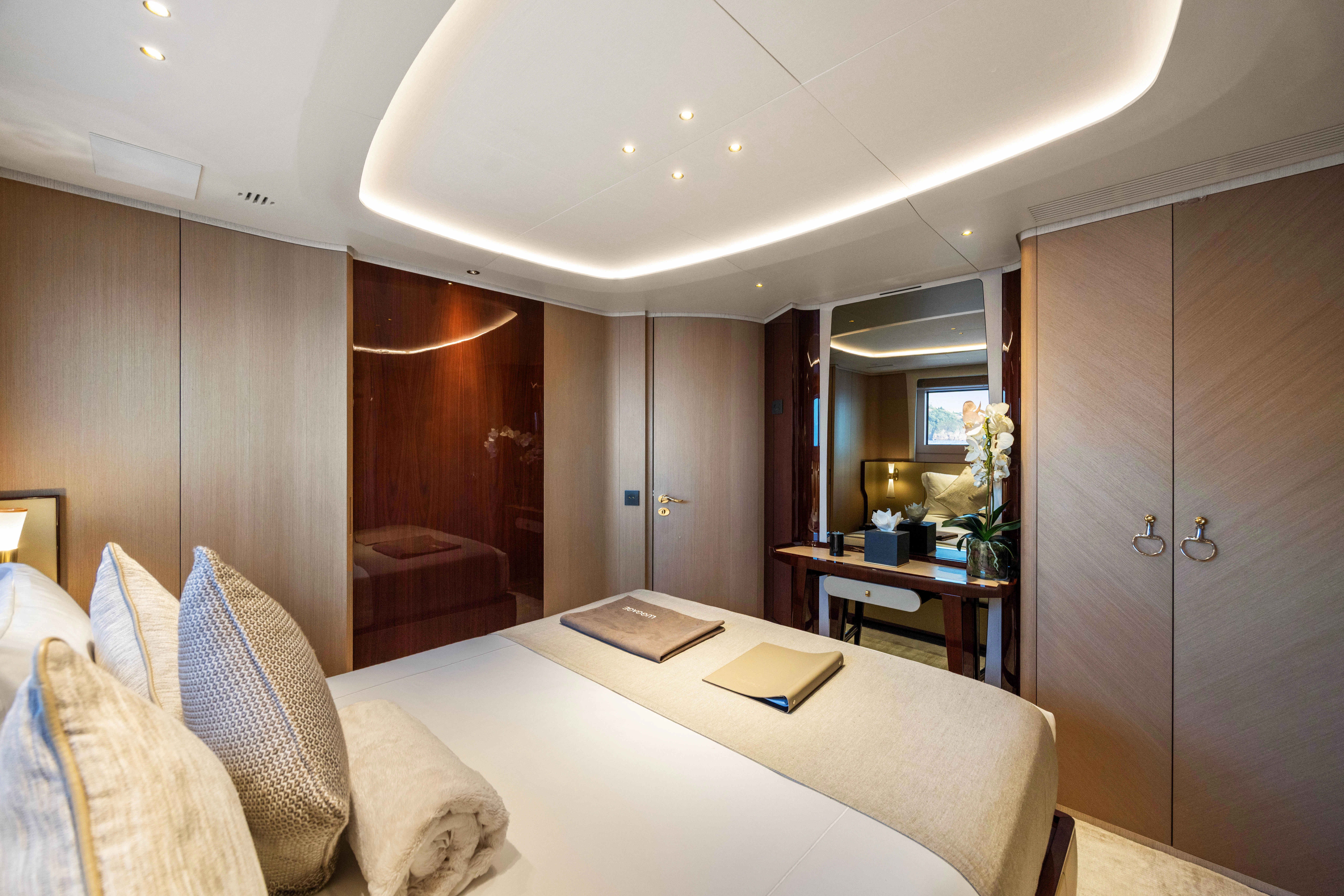 a room with a table and chairs aboard TRAMONTO Yacht for Charter
