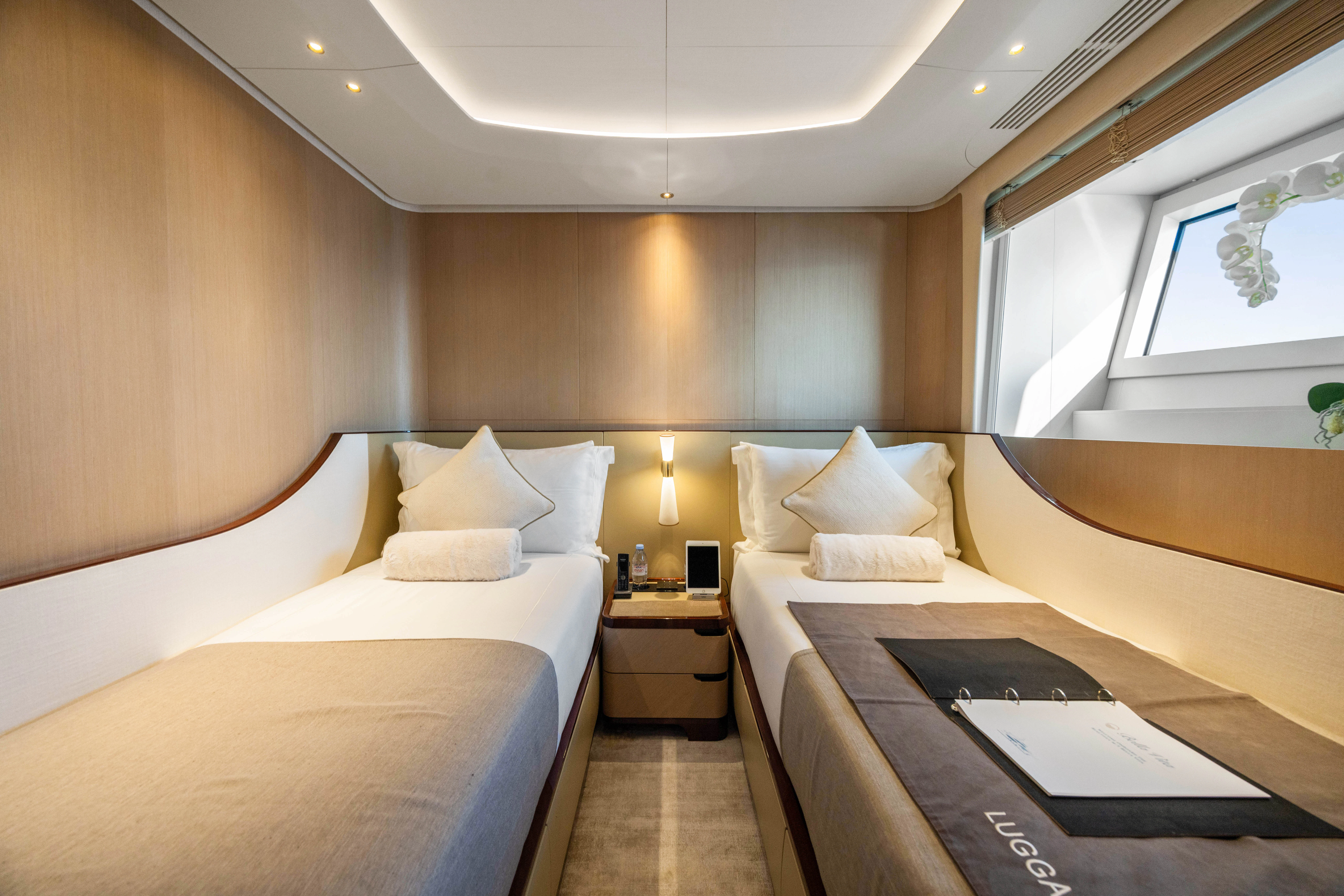 a room with two beds aboard TRAMONTO Yacht for Charter