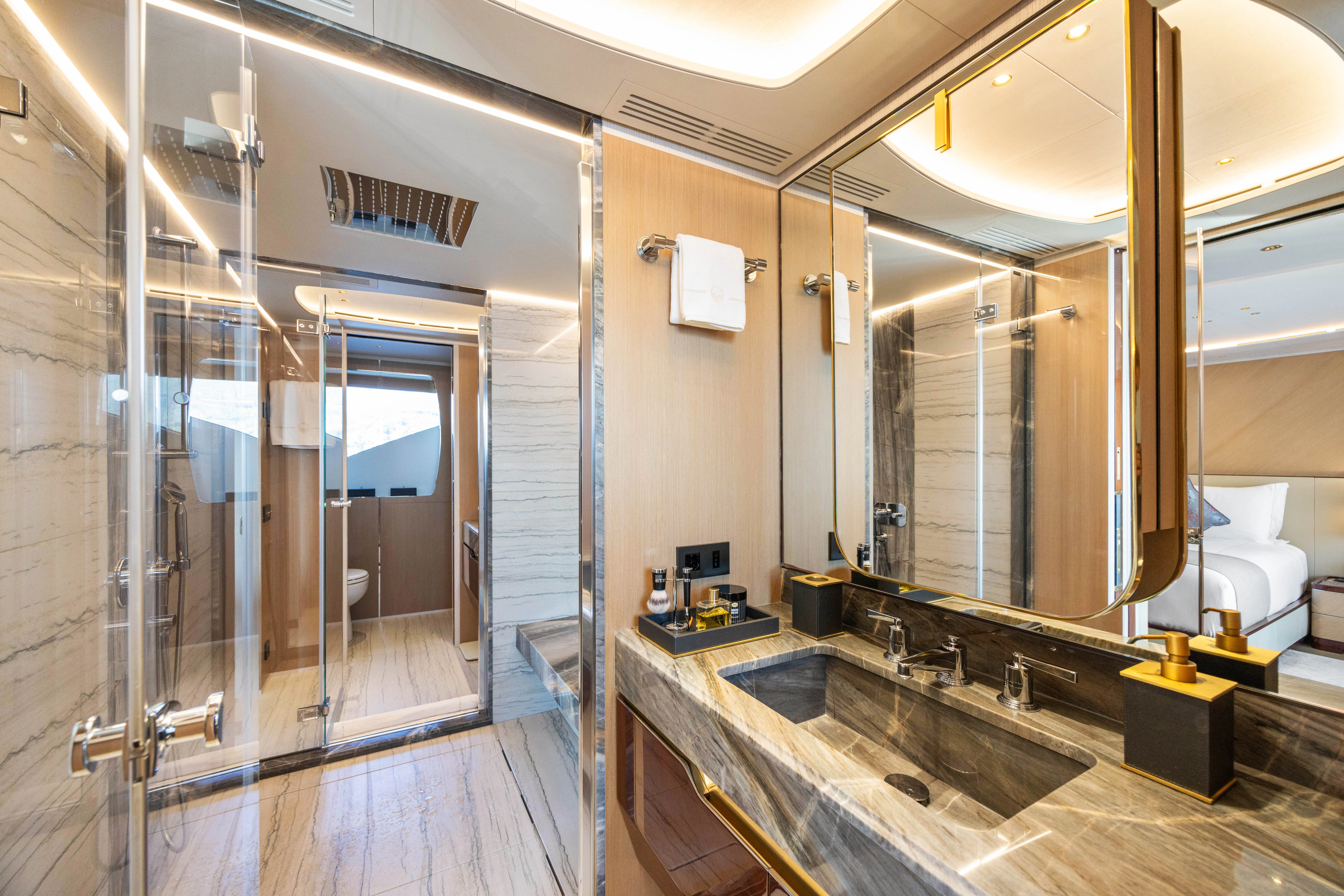 a bathroom with a large mirror aboard TRAMONTO Yacht for Charter