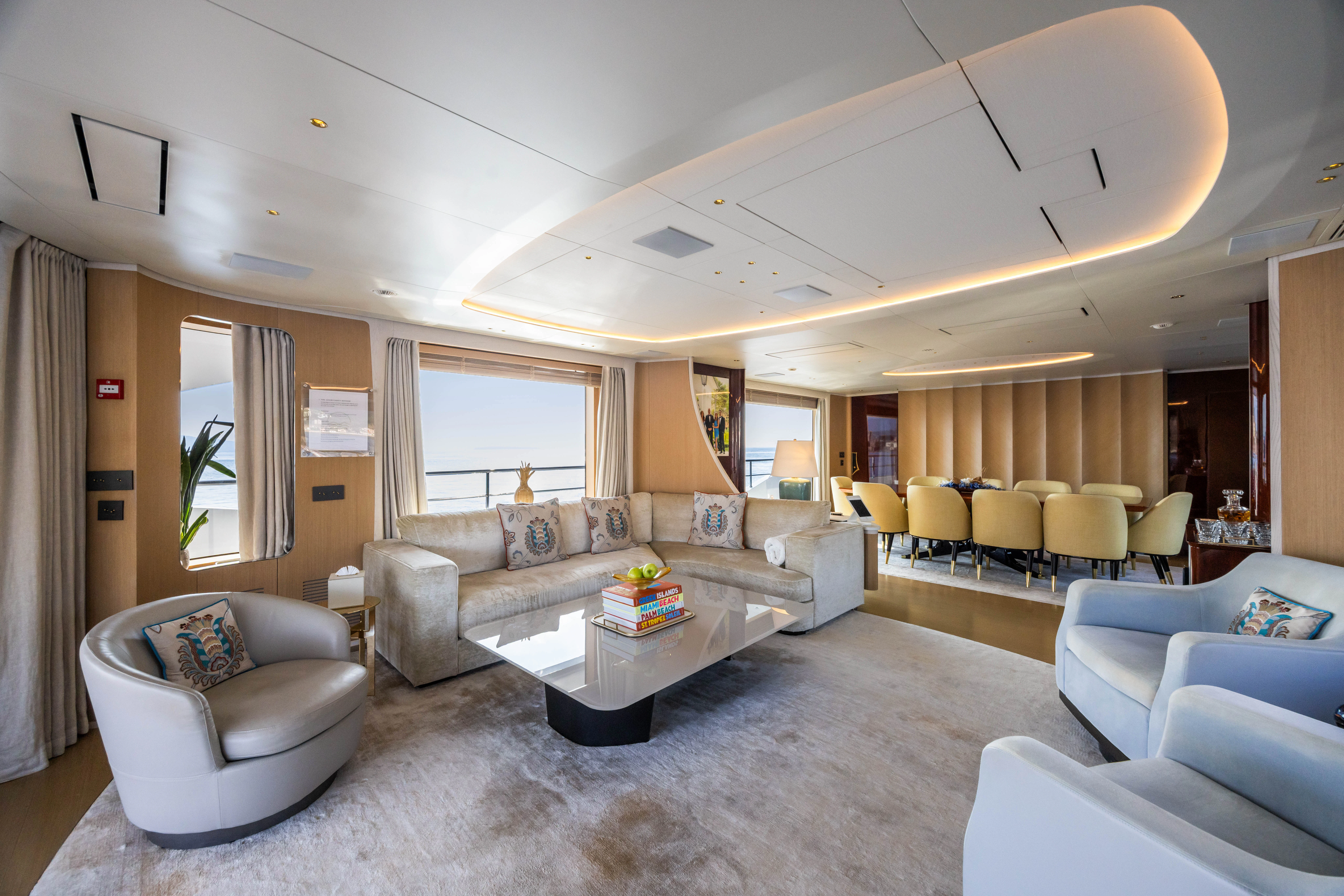 a living room with a couch and a table aboard TRAMONTO Yacht for Charter