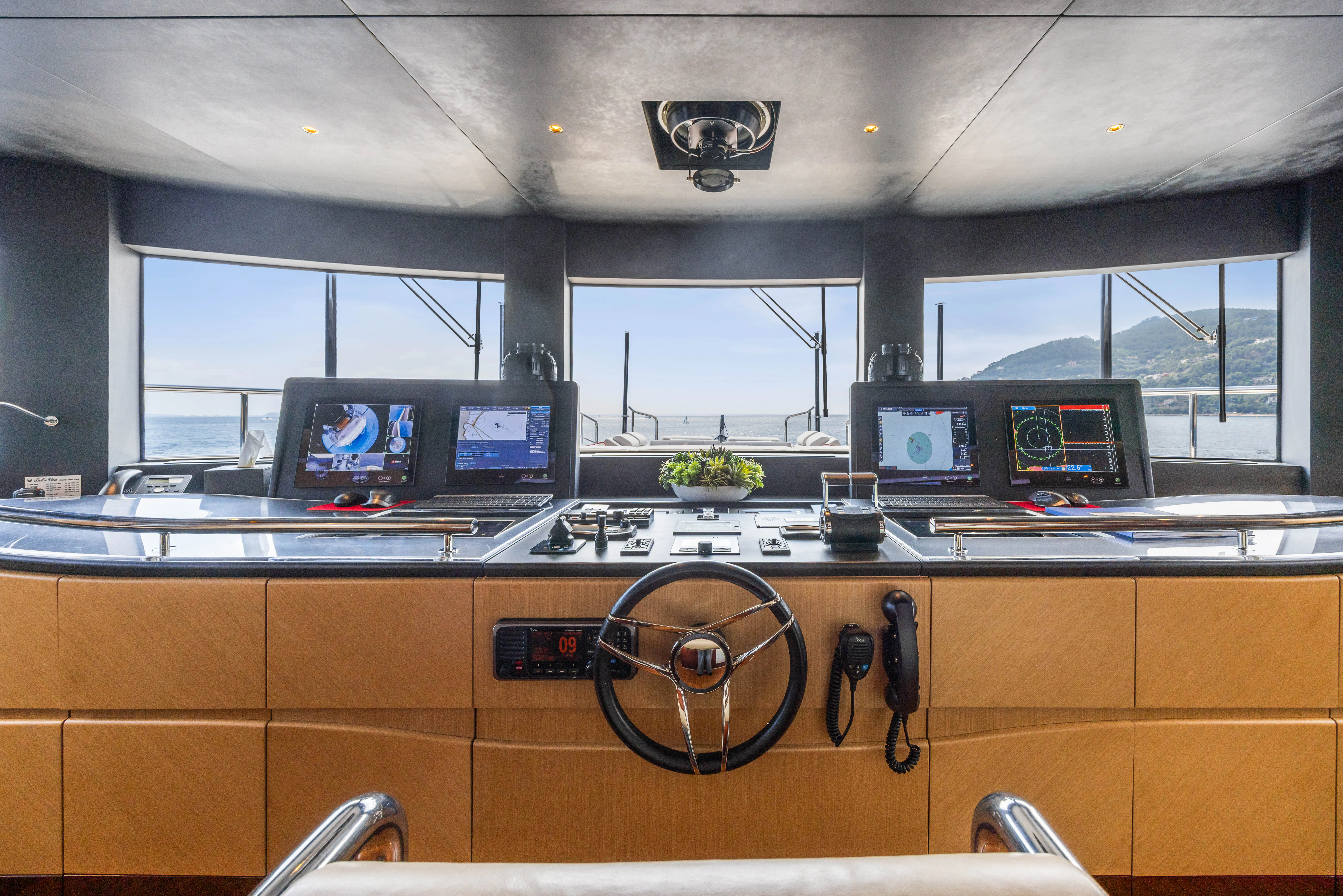 a kitchen with a countertop and several computers aboard TRAMONTO Yacht for Charter