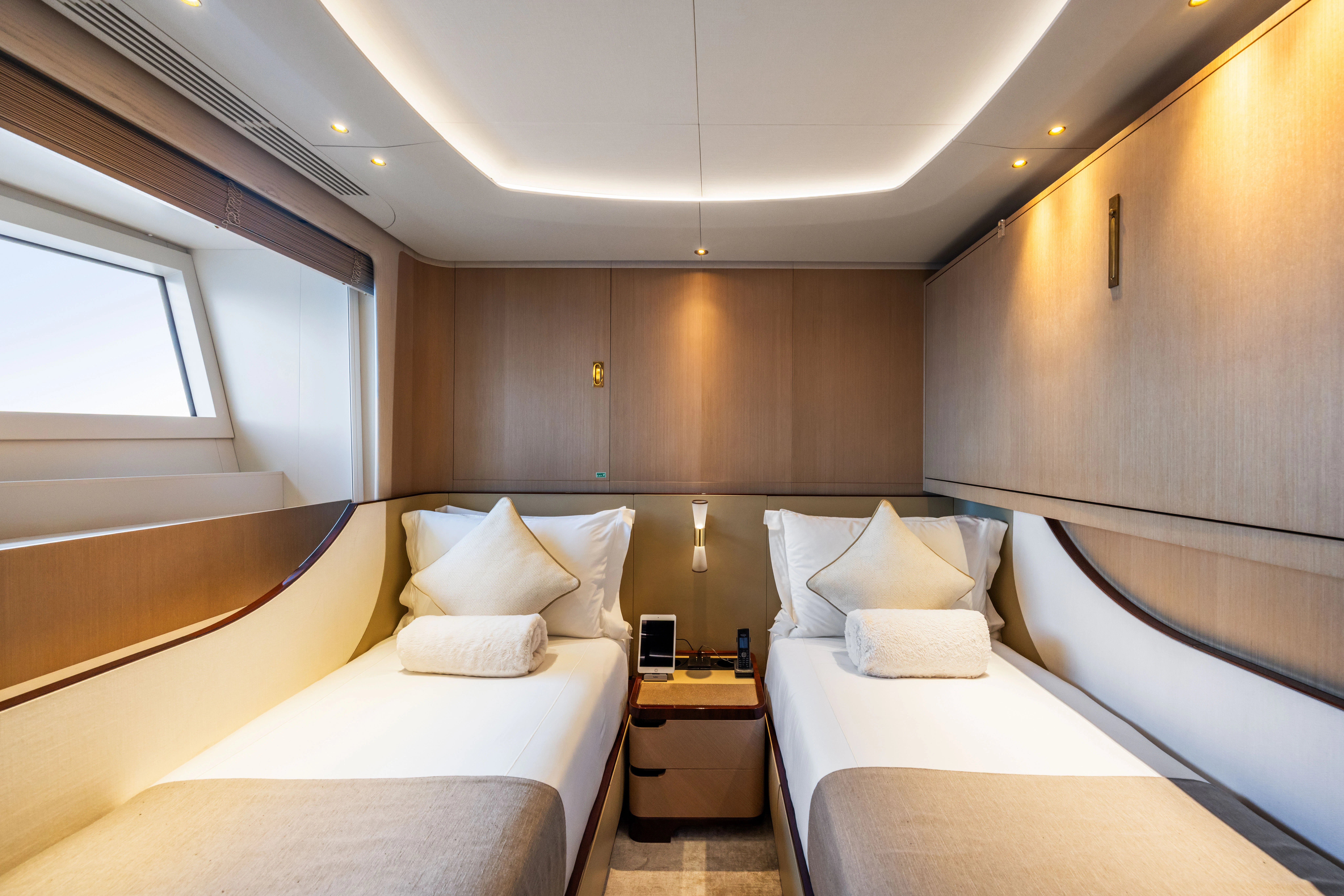 a room with two beds aboard TRAMONTO Yacht for Charter