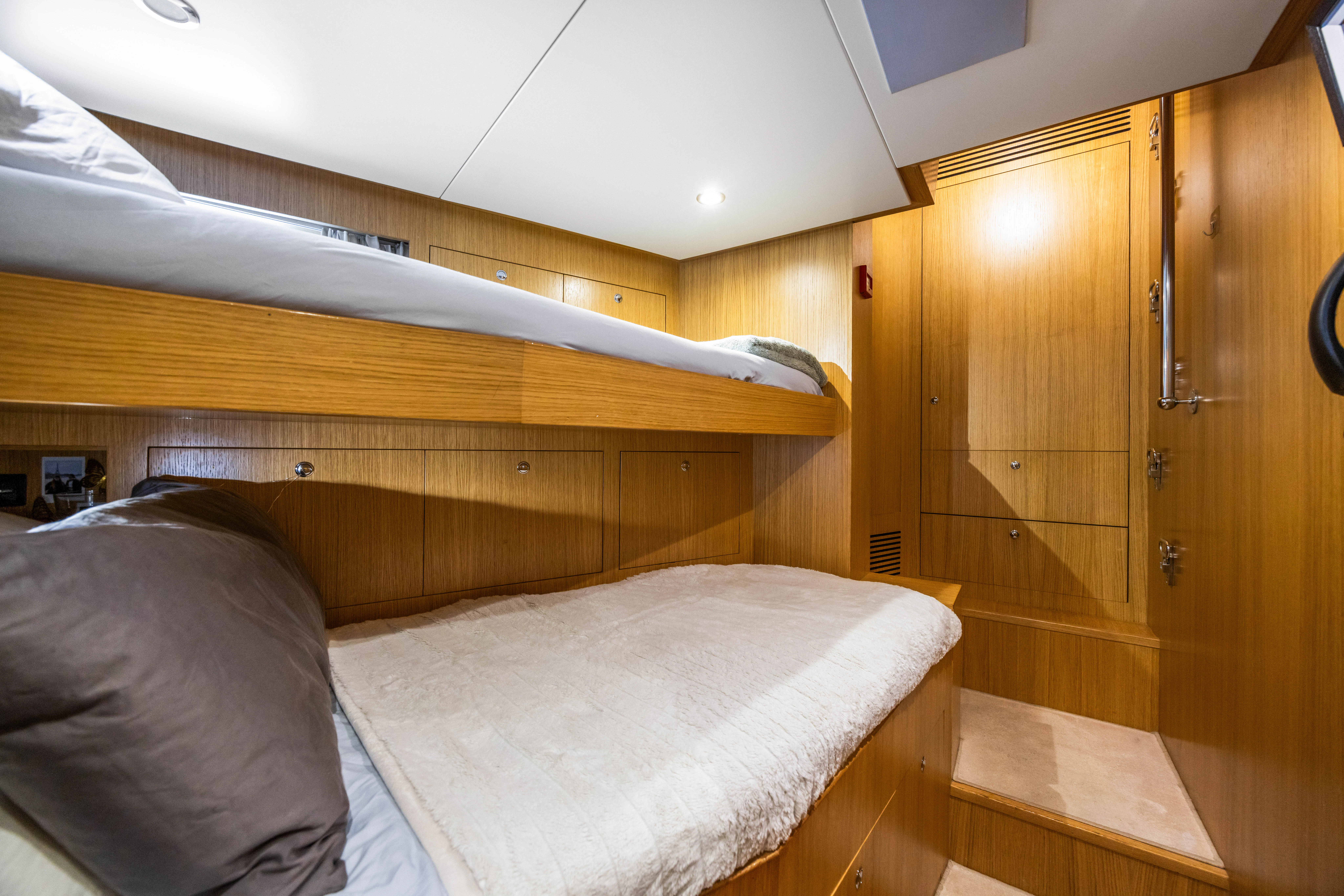 a bed in a room aboard TRAMONTO Yacht for Charter