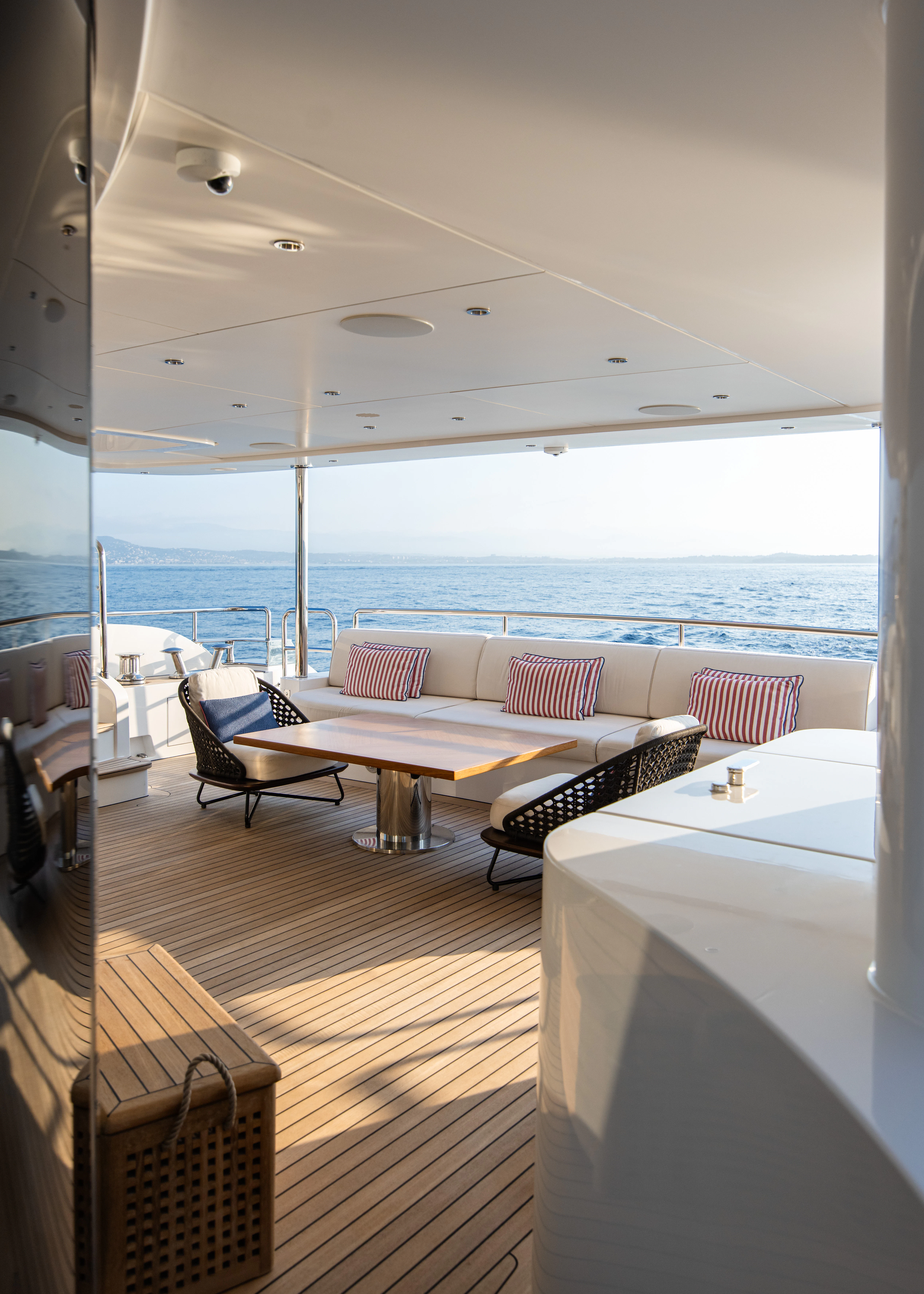 a room with a table and chairs aboard TRAMONTO Yacht for Charter