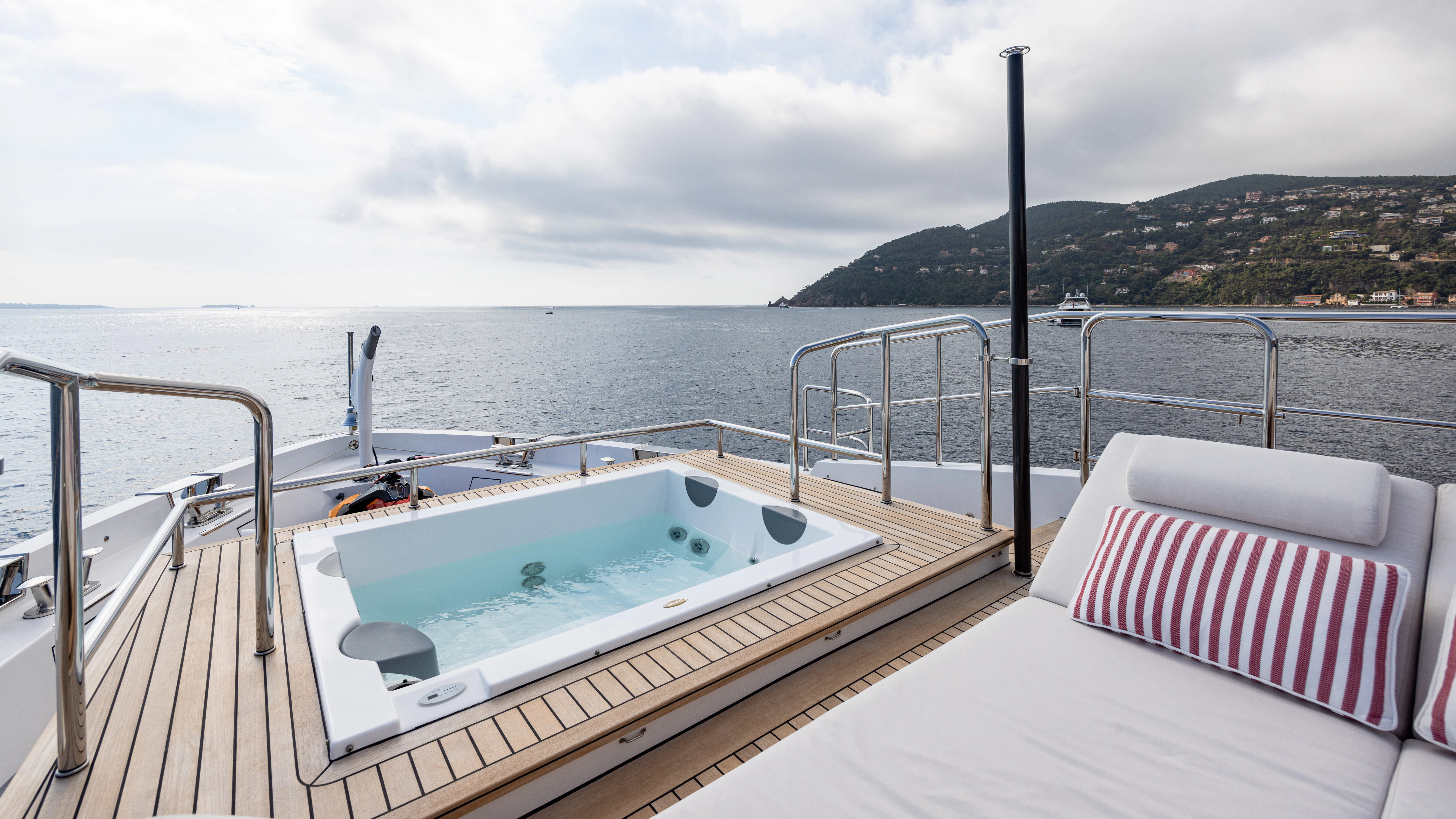 a large white swimming pool on a boat in the water aboard TRAMONTO Yacht for Charter