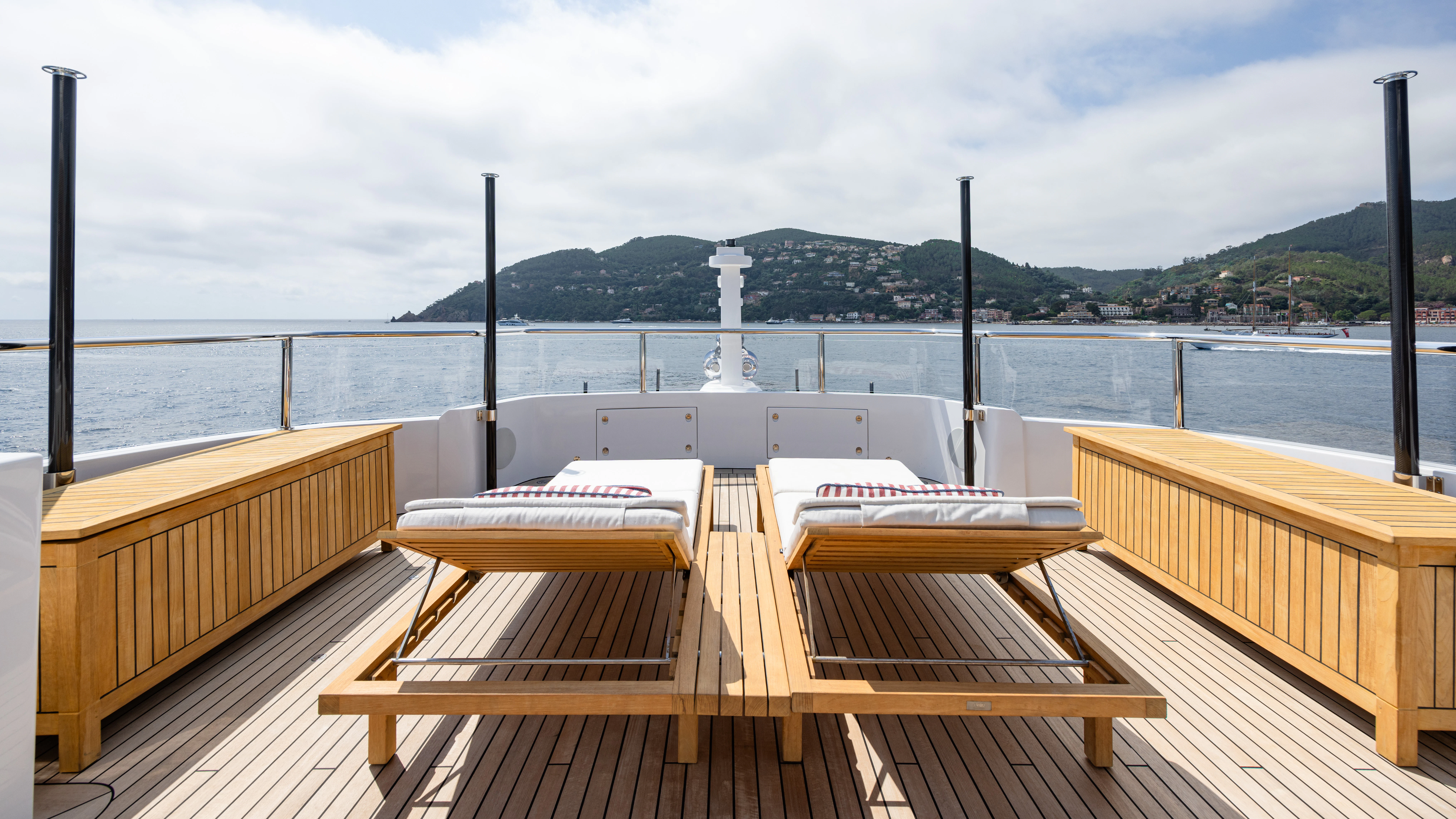 a deck overlooking a body of water aboard TRAMONTO Yacht for Charter