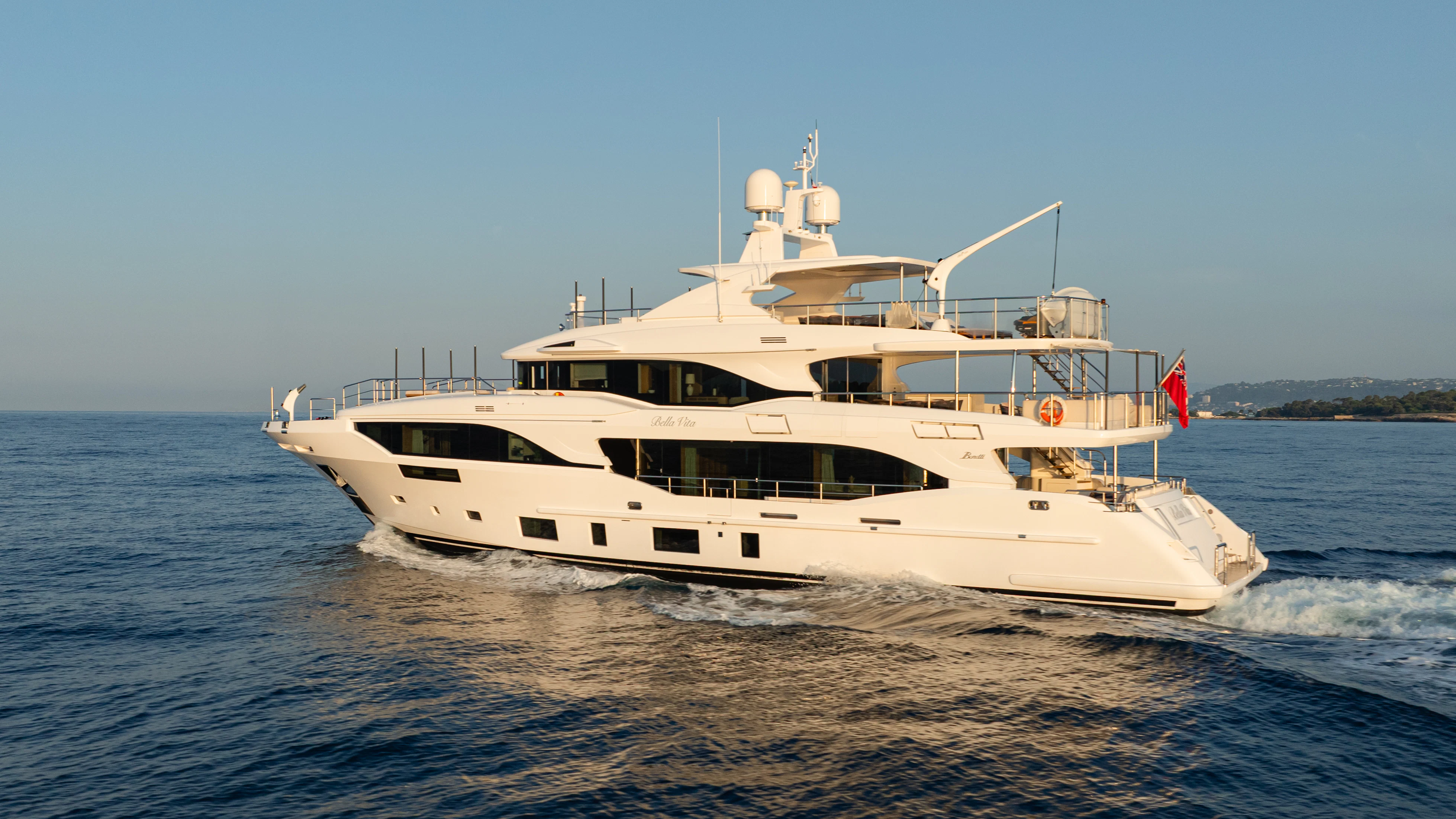 a white yacht on the water aboard TRAMONTO Yacht for Charter