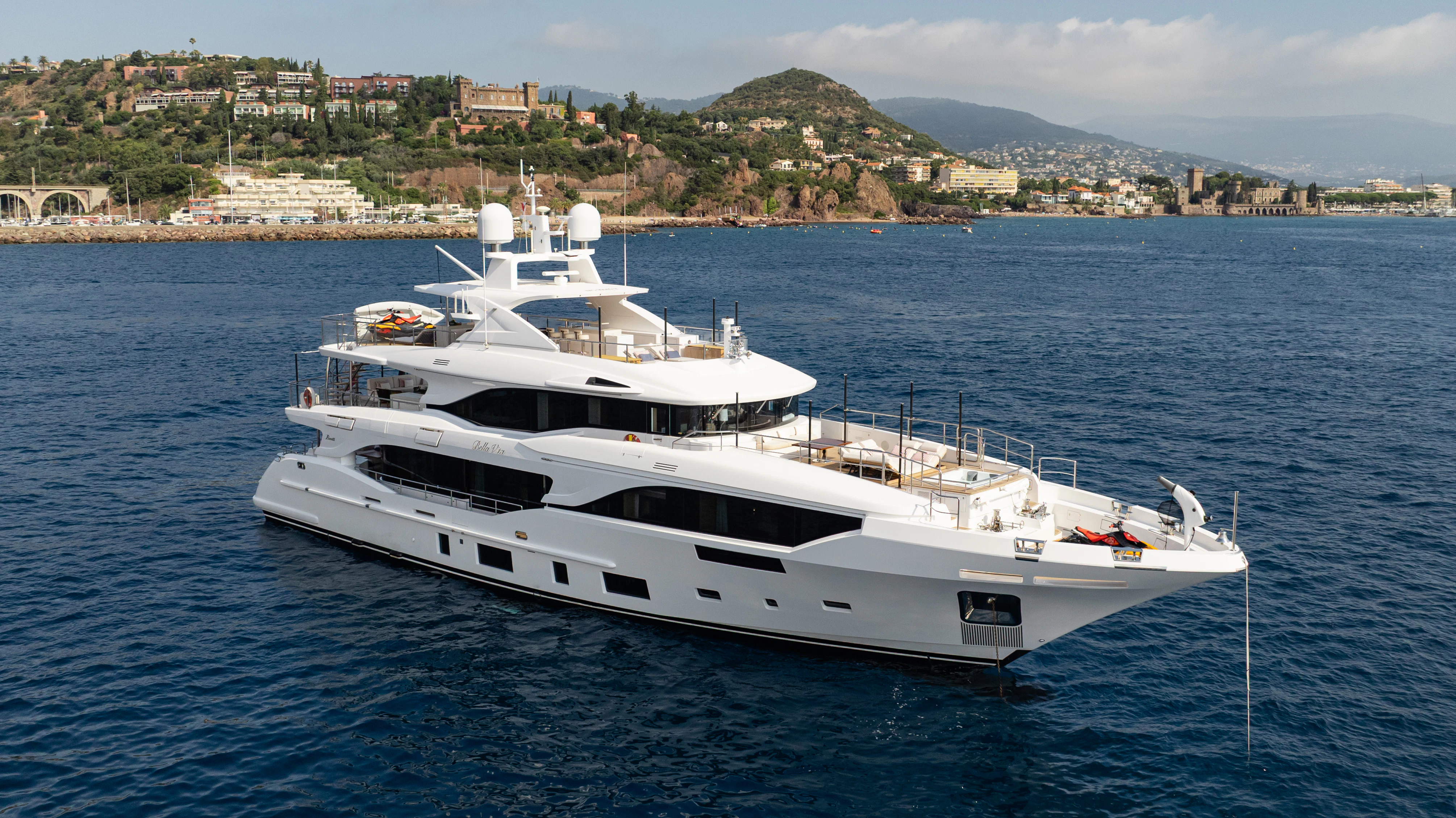 a white yacht in the water aboard TRAMONTO Yacht for Charter