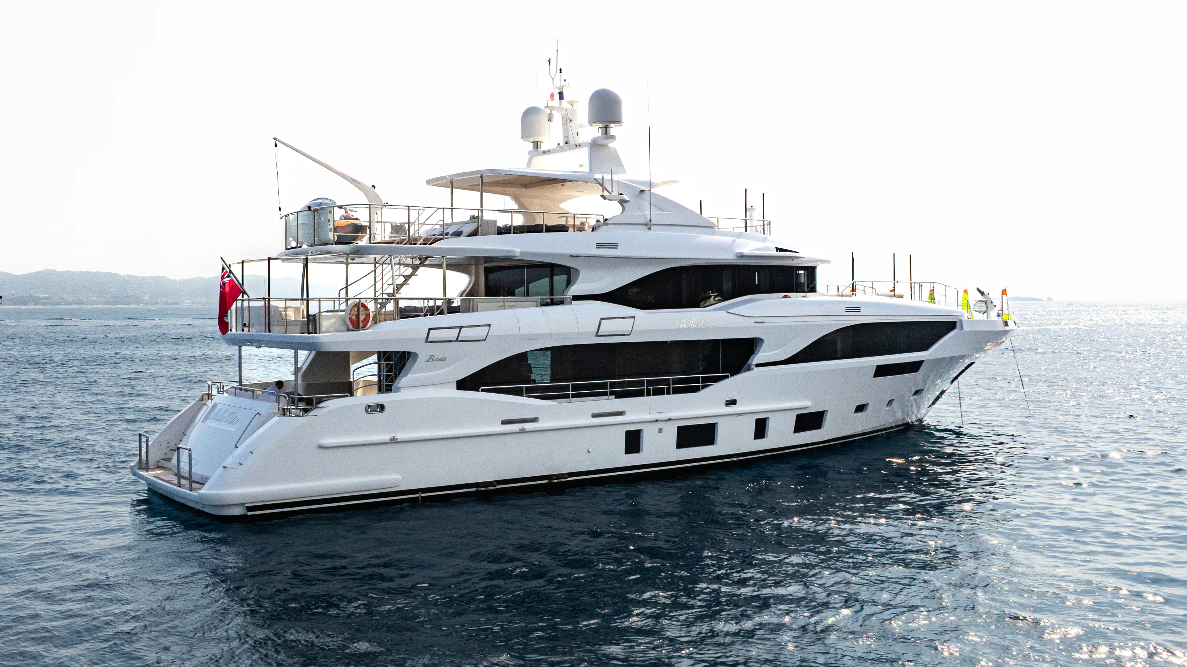 a white yacht in the water aboard TRAMONTO Yacht for Charter