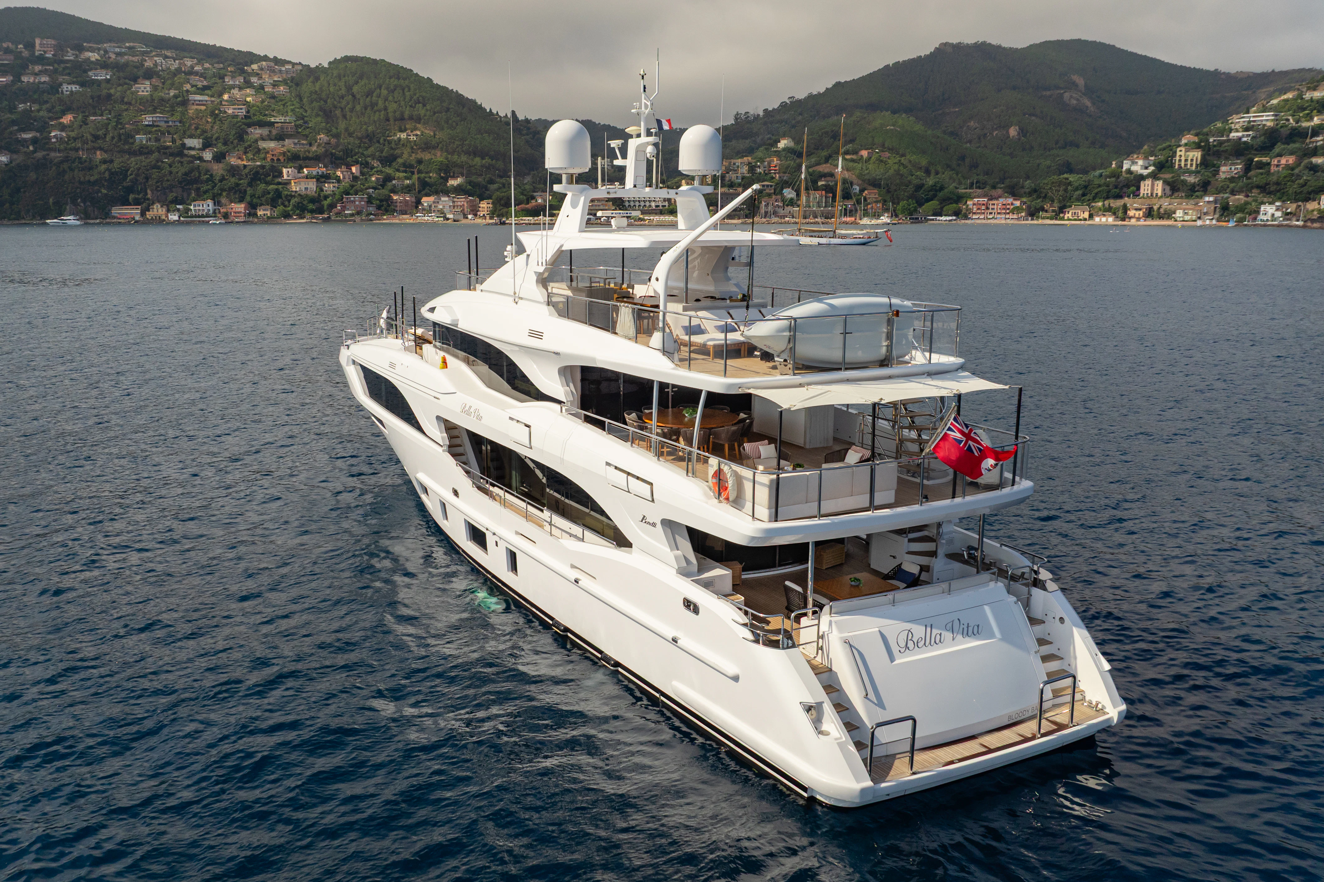 a white boat in the water aboard TRAMONTO Yacht for Charter