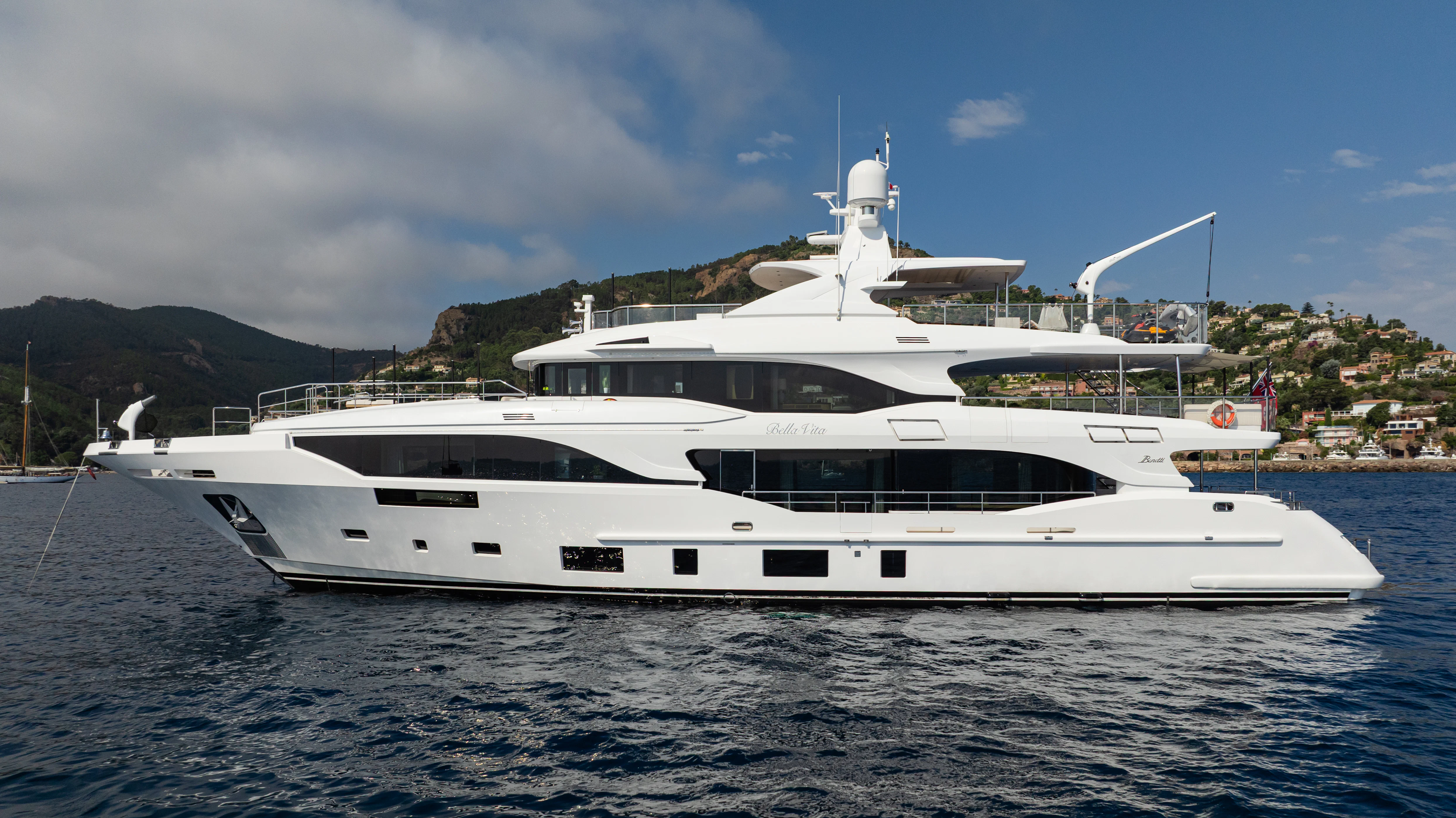 a white yacht in the water aboard TRAMONTO Yacht for Charter