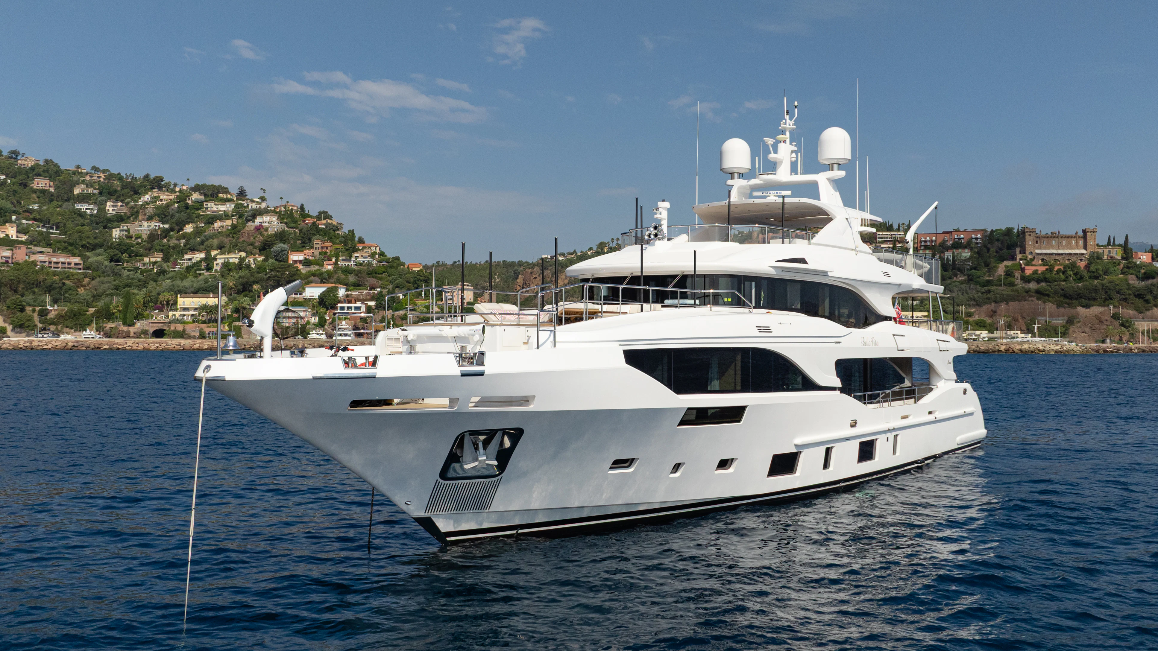 a white yacht in the water aboard TRAMONTO Yacht for Charter