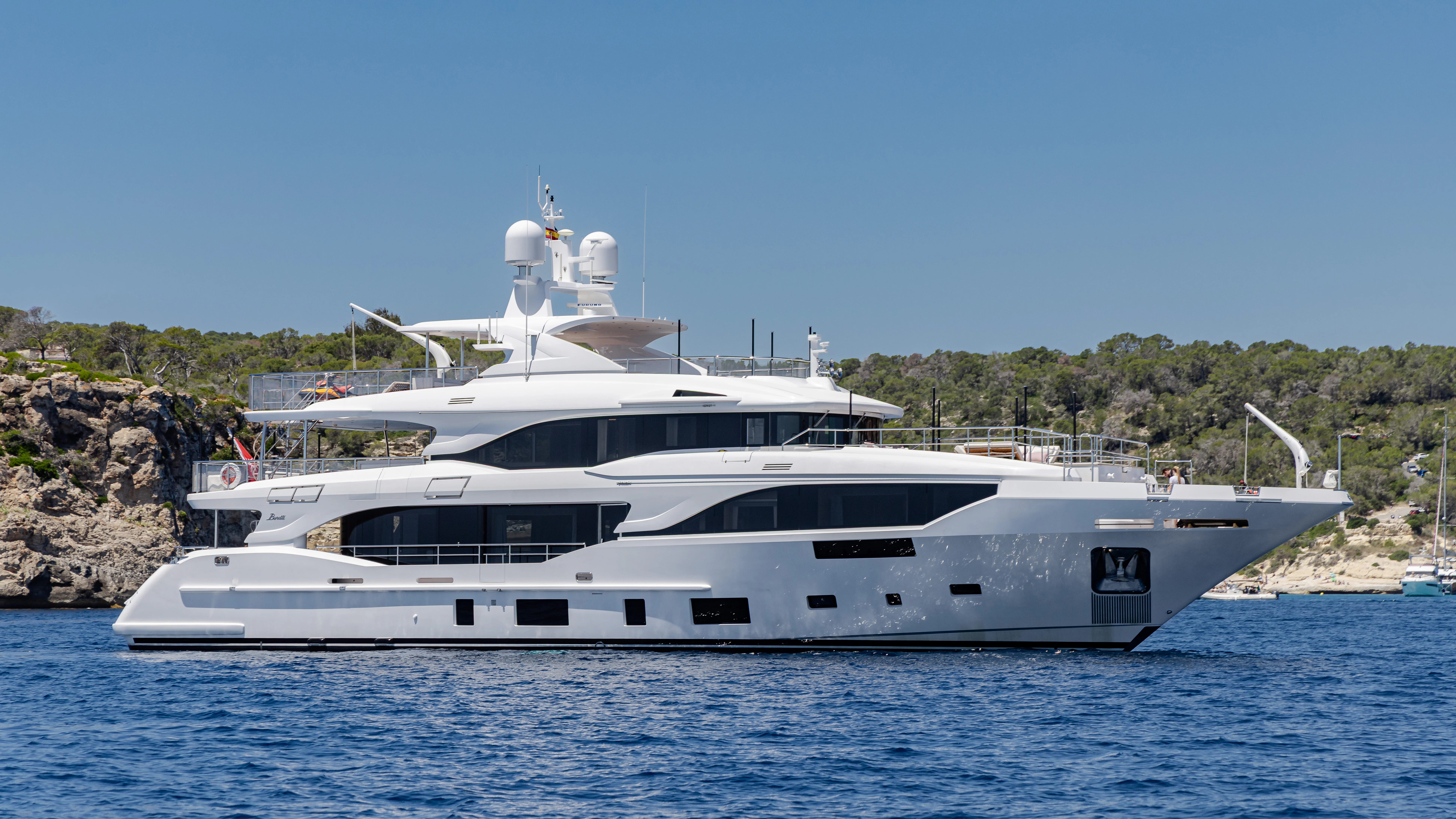 a white yacht in the water aboard TRAMONTO Yacht for Charter
