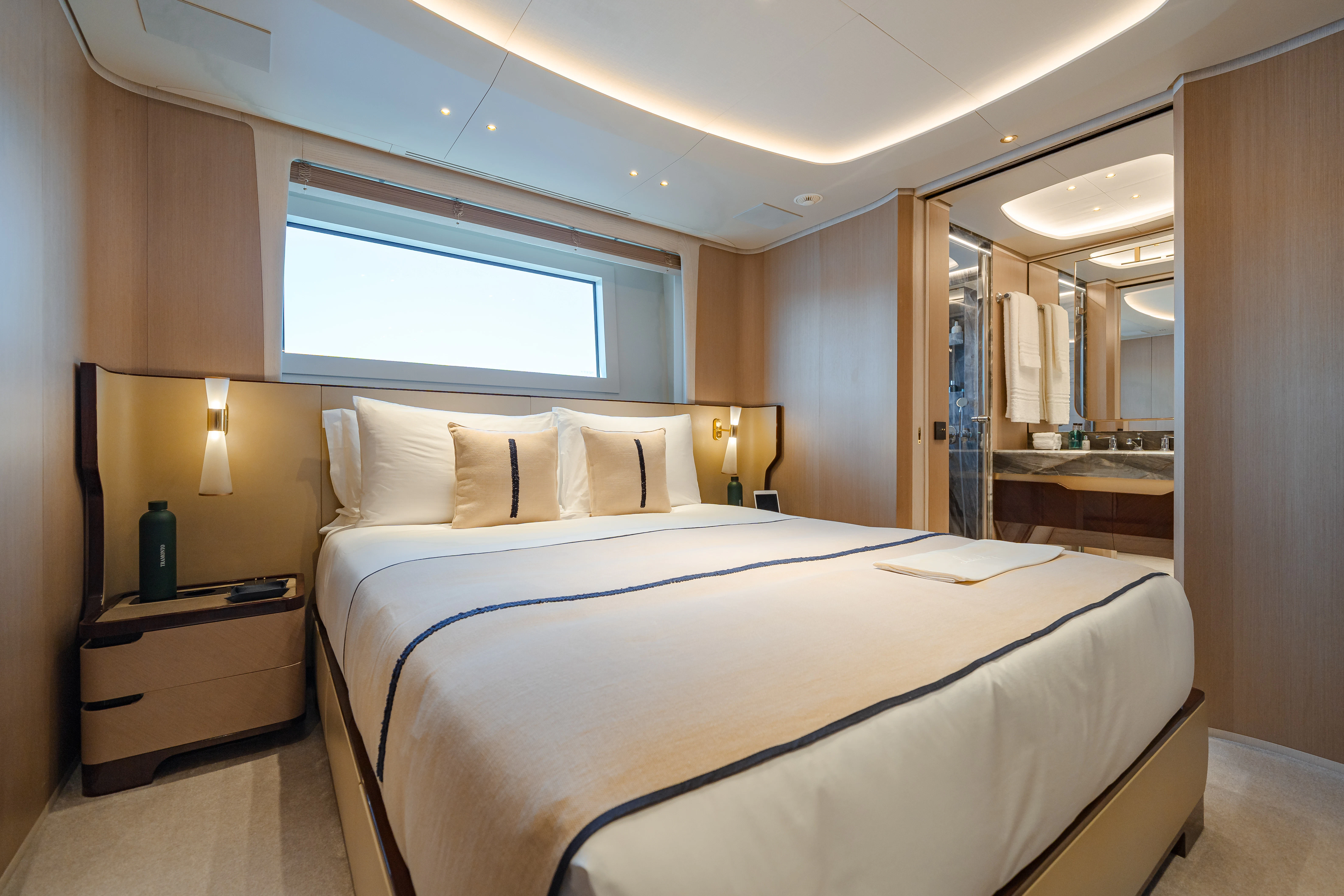 a bed in a hotel room aboard TRAMONTO Yacht for Charter