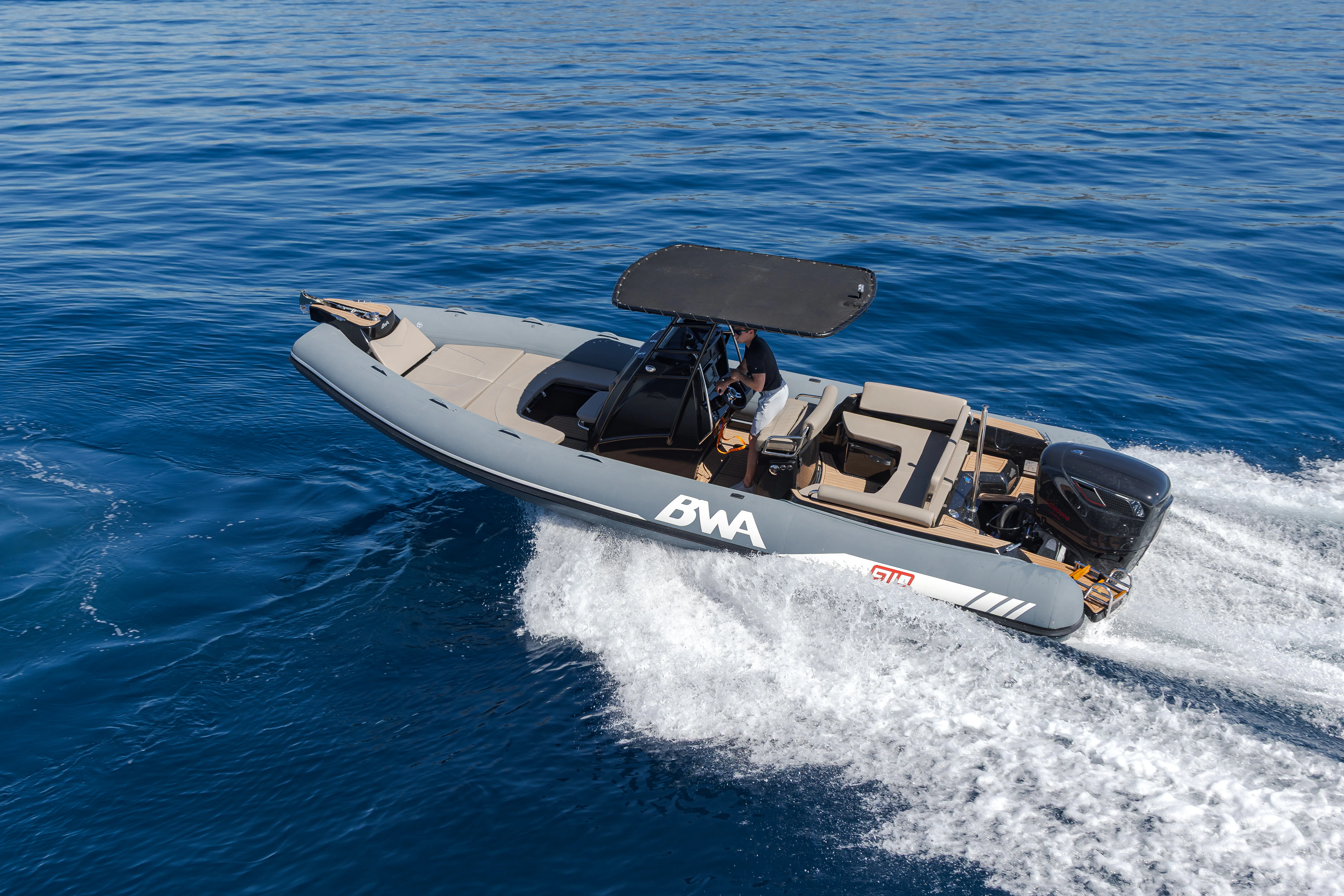 a boat with a motor attached to it aboard TRAMONTO Yacht for Charter