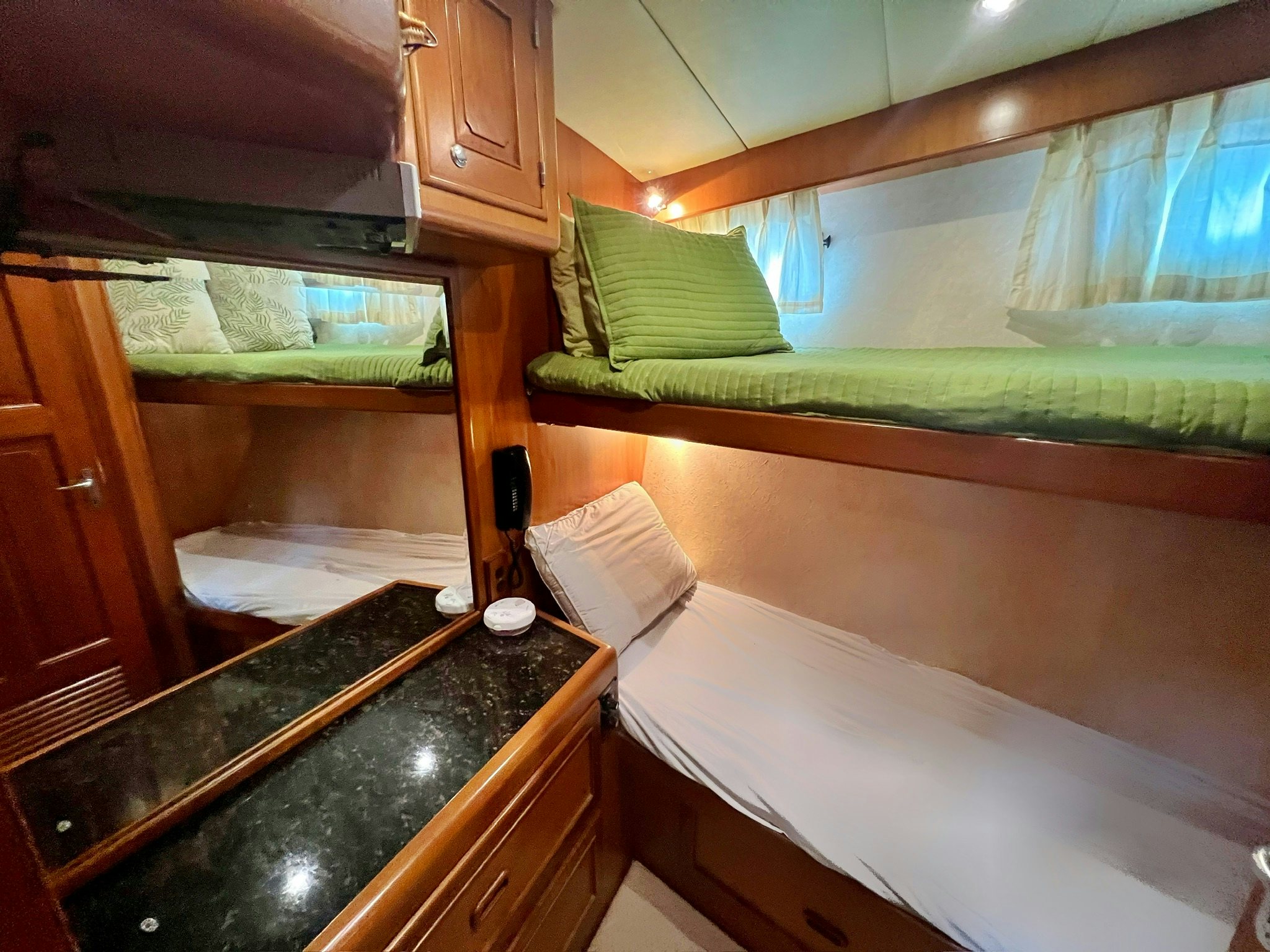 a bathroom with a sink and a mirror aboard SYNERGY Yacht for Sale