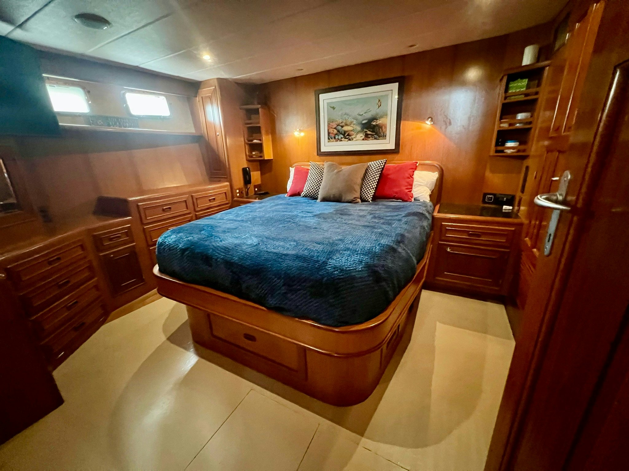 a bed in a room aboard SYNERGY Yacht for Sale