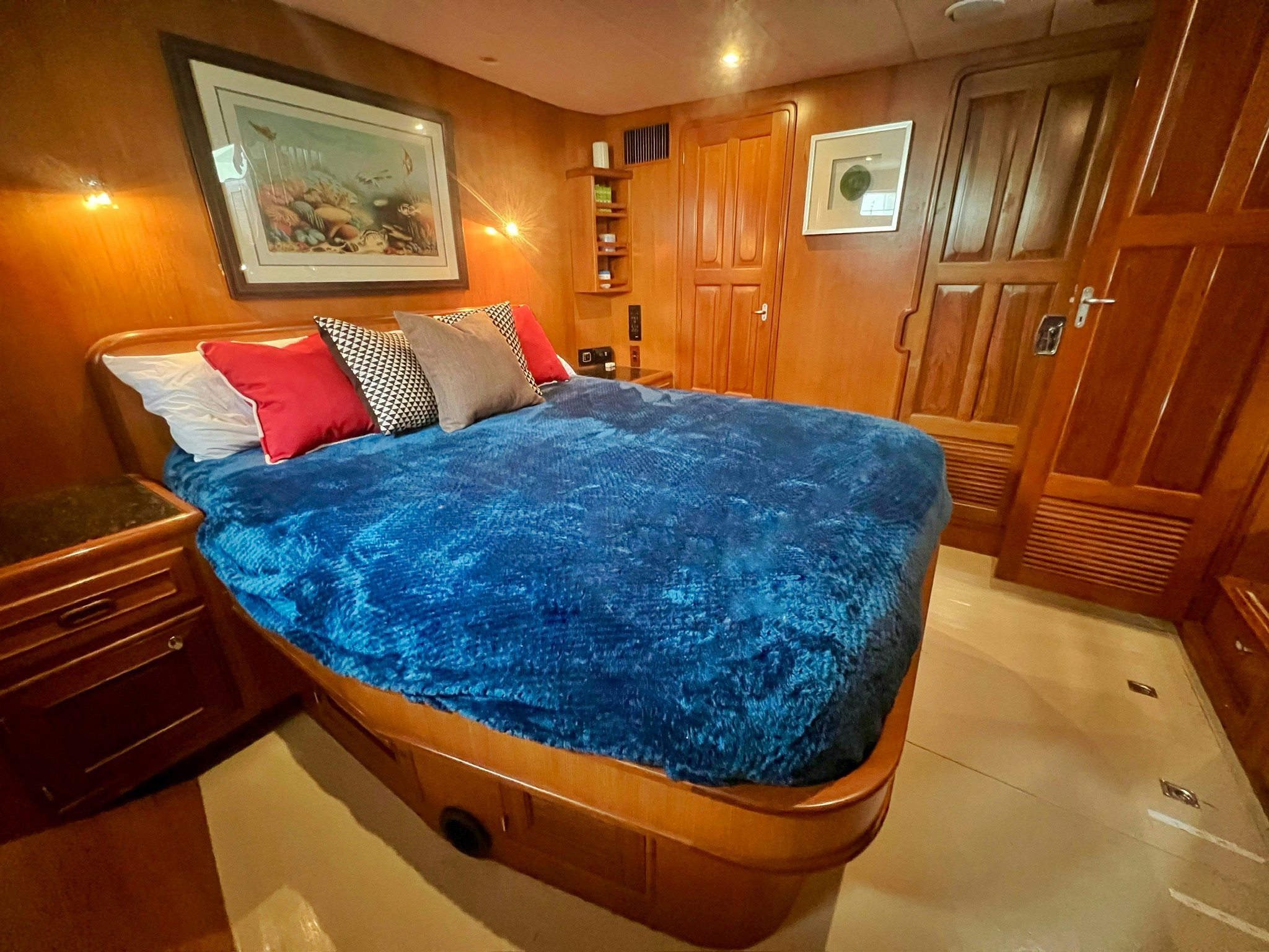 a bed in a room aboard SYNERGY Yacht for Sale