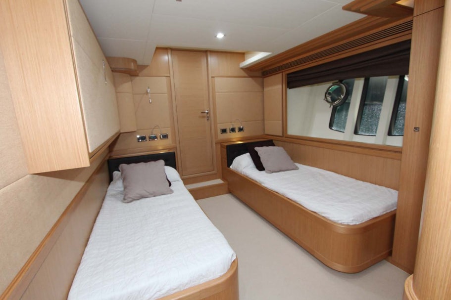 a room with two beds aboard ALL WE NEED FOR TODAY Yacht for Sale