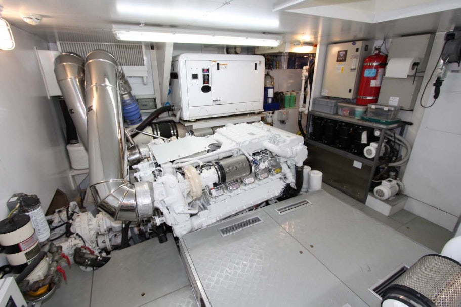 a room with a machine and machinery aboard ALL WE NEED FOR TODAY Yacht for Sale