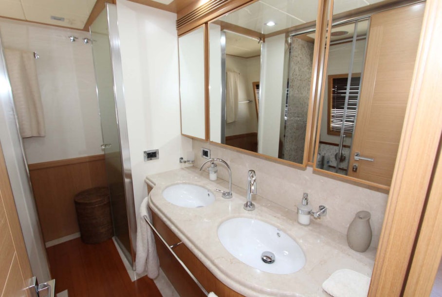 a bathroom with two sinks aboard ALL WE NEED FOR TODAY Yacht for Sale