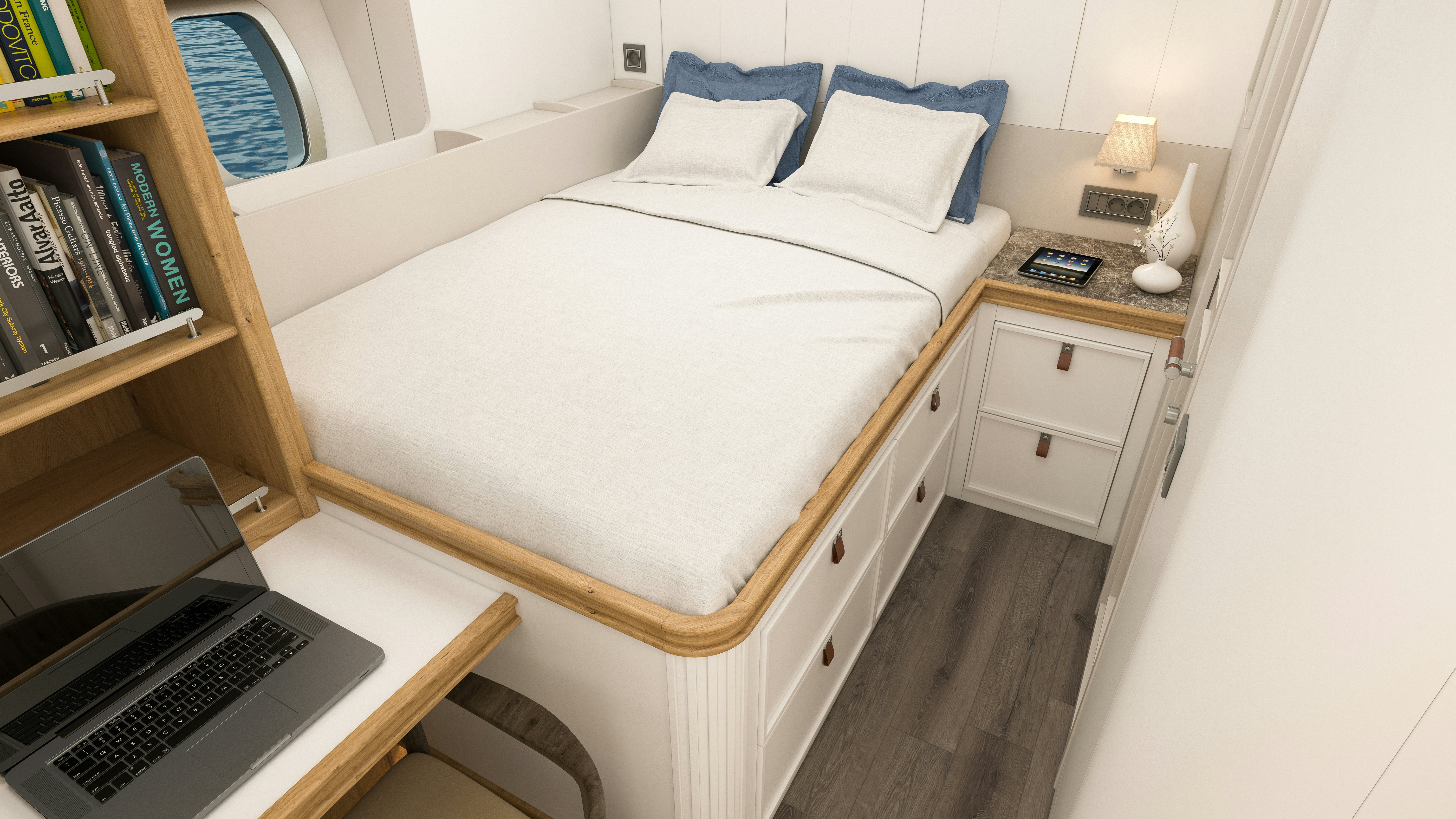 a bed with a laptop on it aboard SIMENA Yacht for Sale