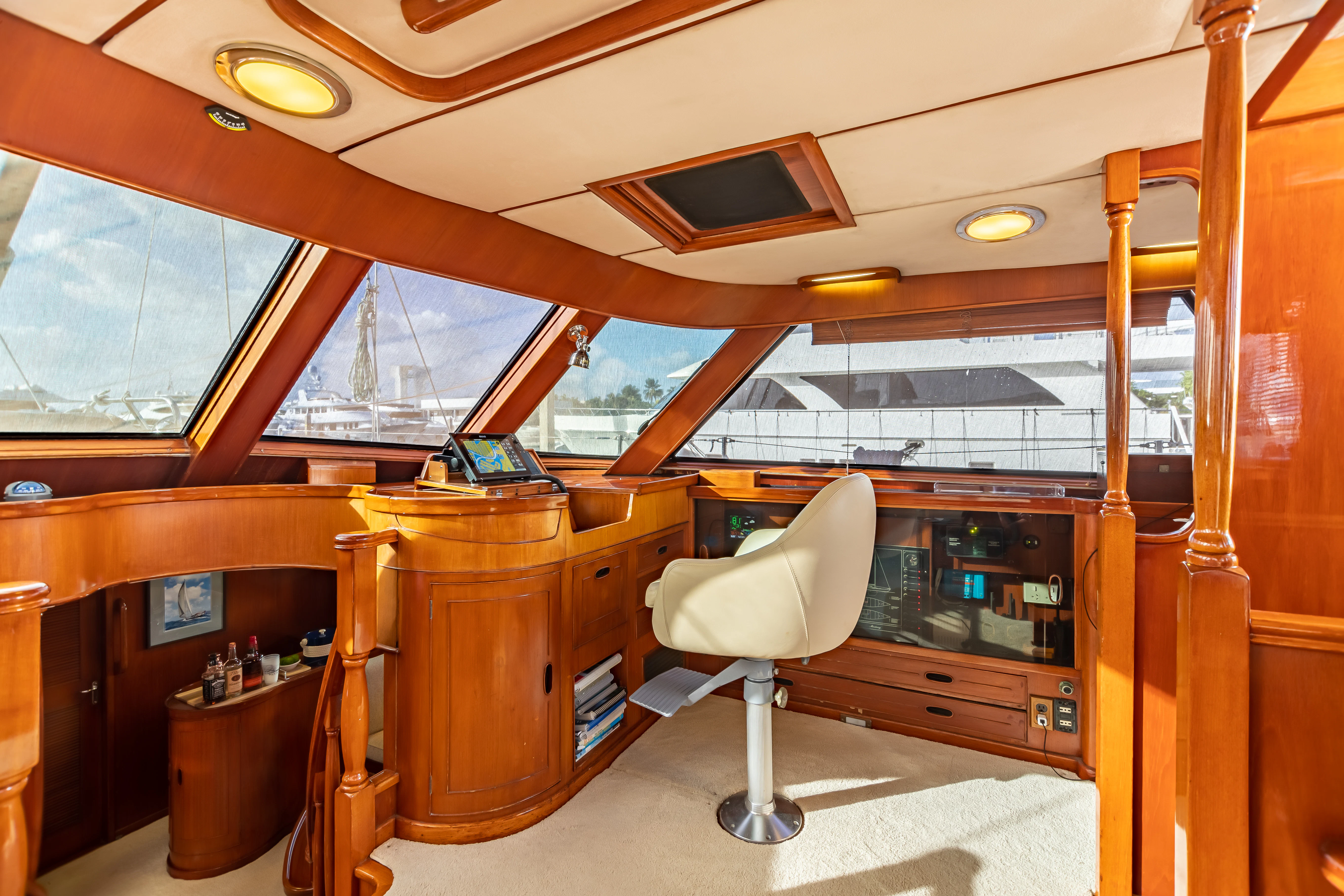 a room with a desk and a chair aboard MUSTANG Yacht for Sale