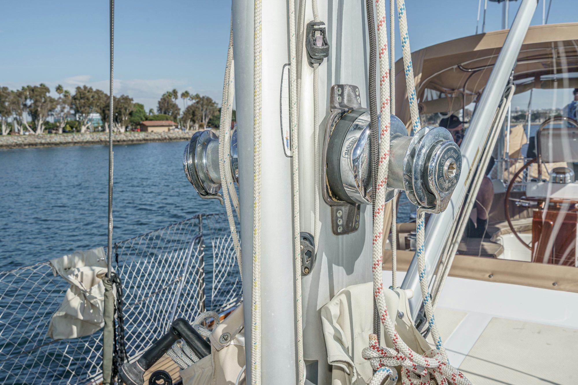 a boat with a net and a fishing pole on the front aboard FEATHER Yacht for Sale