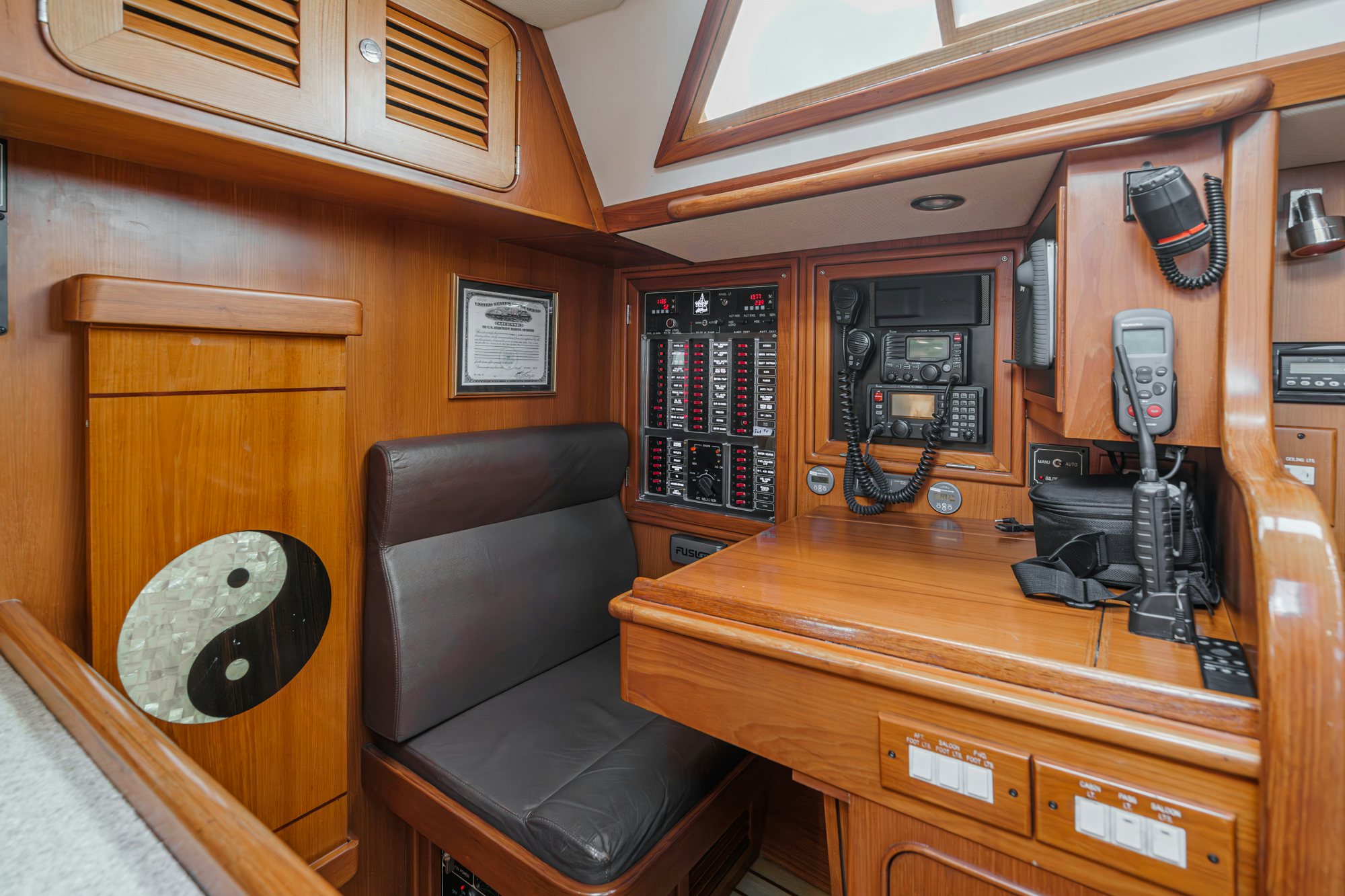 a chair and a desk in a room aboard FEATHER Yacht for Sale