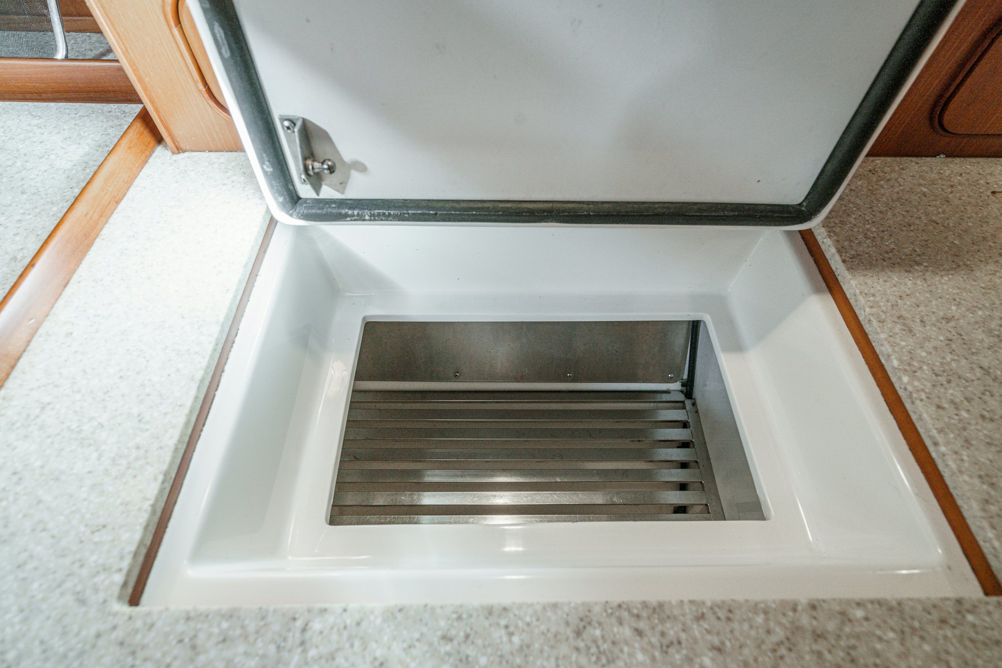 a silver toaster oven aboard FEATHER Yacht for Sale