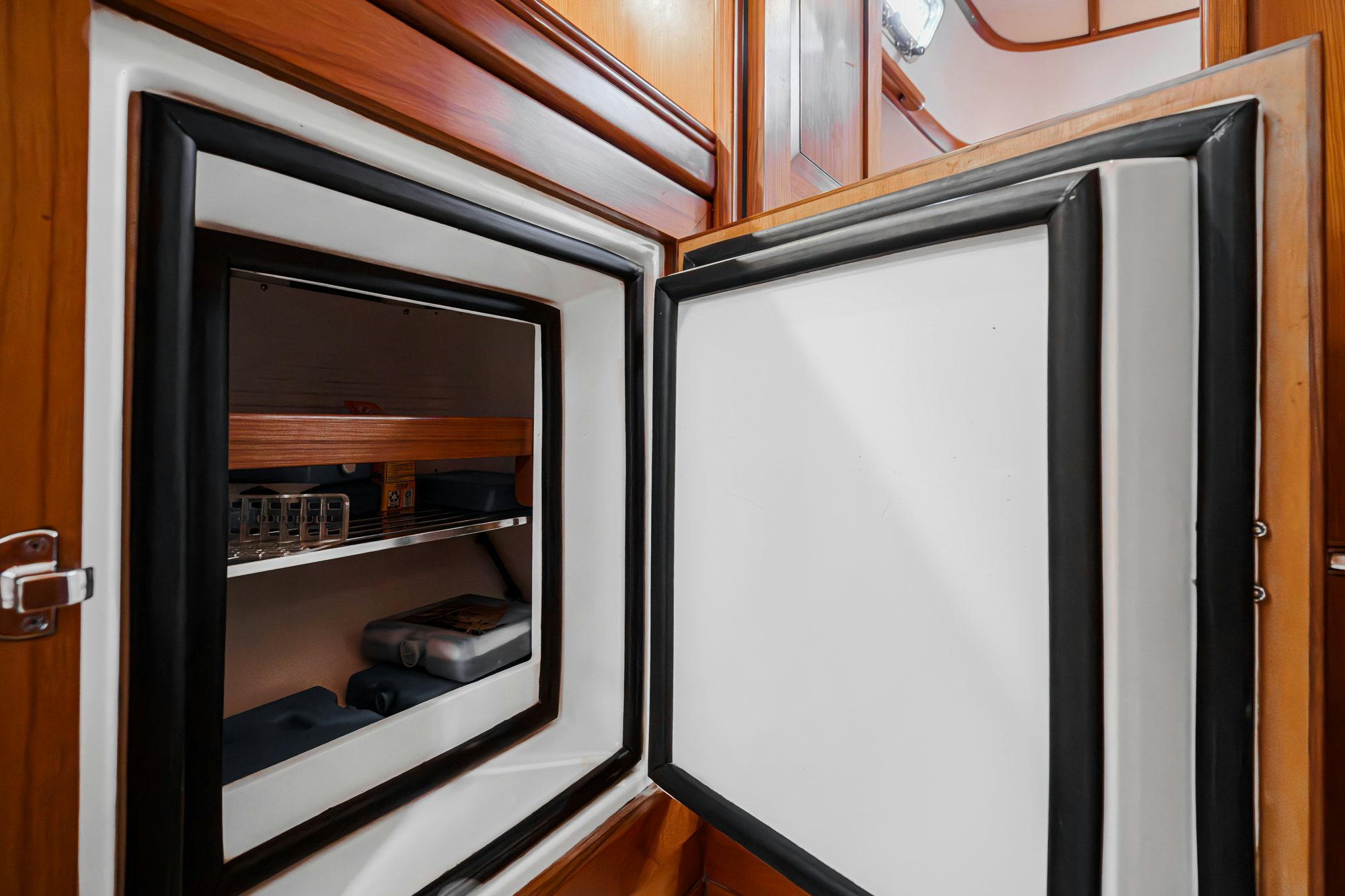 a closet with a mirror aboard FEATHER Yacht for Sale