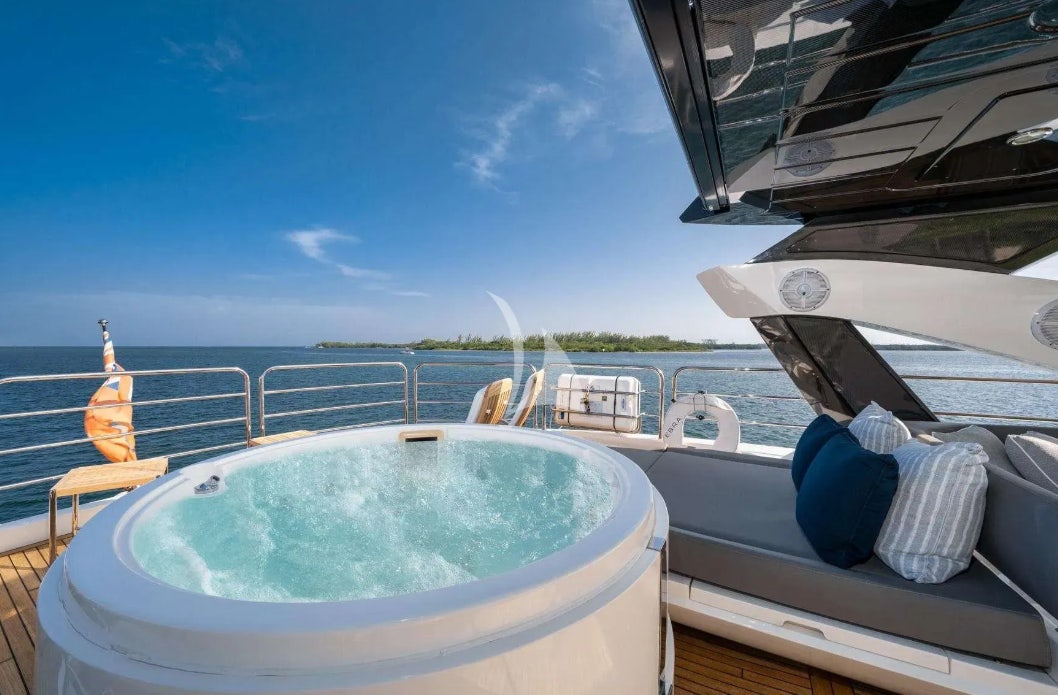 a boat with a person on it aboard OASIS Yacht for Charter