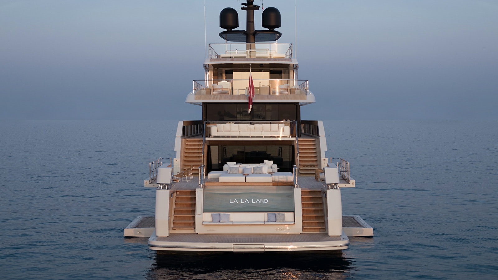 a large ship in the water aboard LA LA LAND Yacht for Charter