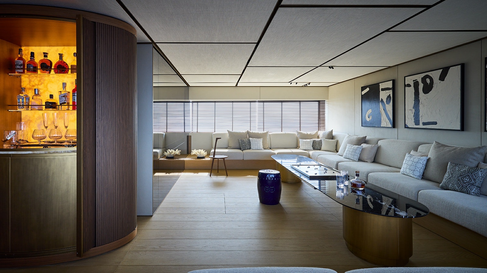 a living room with a large window aboard LA LA LAND Yacht for Charter