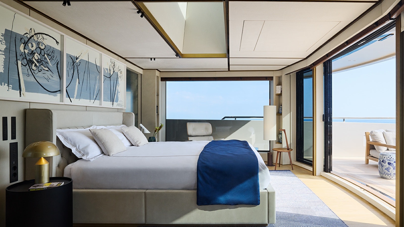 a bedroom with a large bed aboard LA LA LAND Yacht for Charter