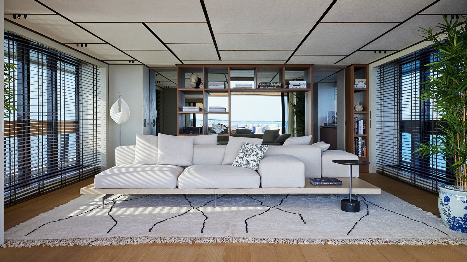 a white couch in a room aboard LA LA LAND Yacht for Charter