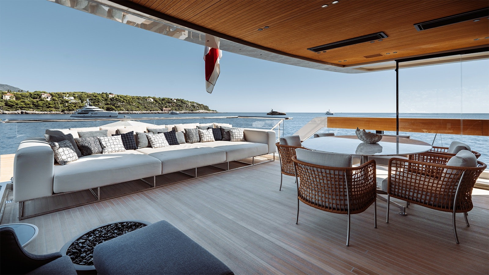 a living room with a large patio aboard LA LA LAND Yacht for Charter