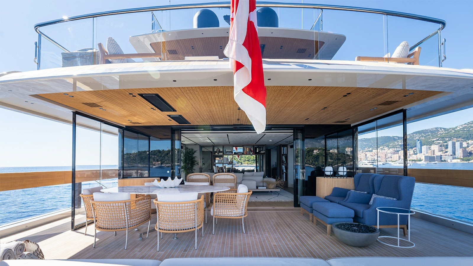 a large lounge area with a large lounge area and a pool aboard LA LA LAND Yacht for Charter