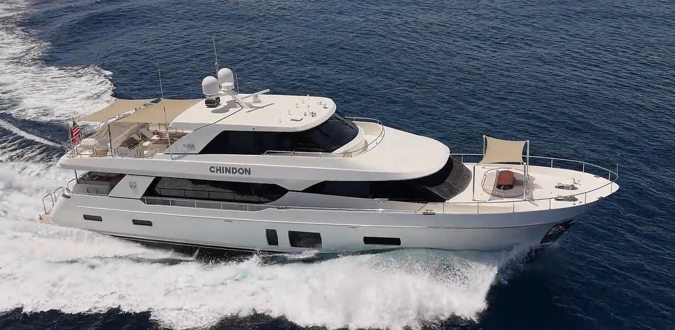 a white yacht on the water aboard CHINDON Yacht for Sale