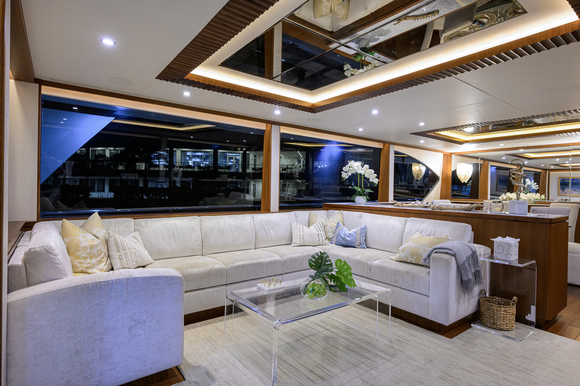 a living room with a large sofa aboard CHINDON Yacht for Sale