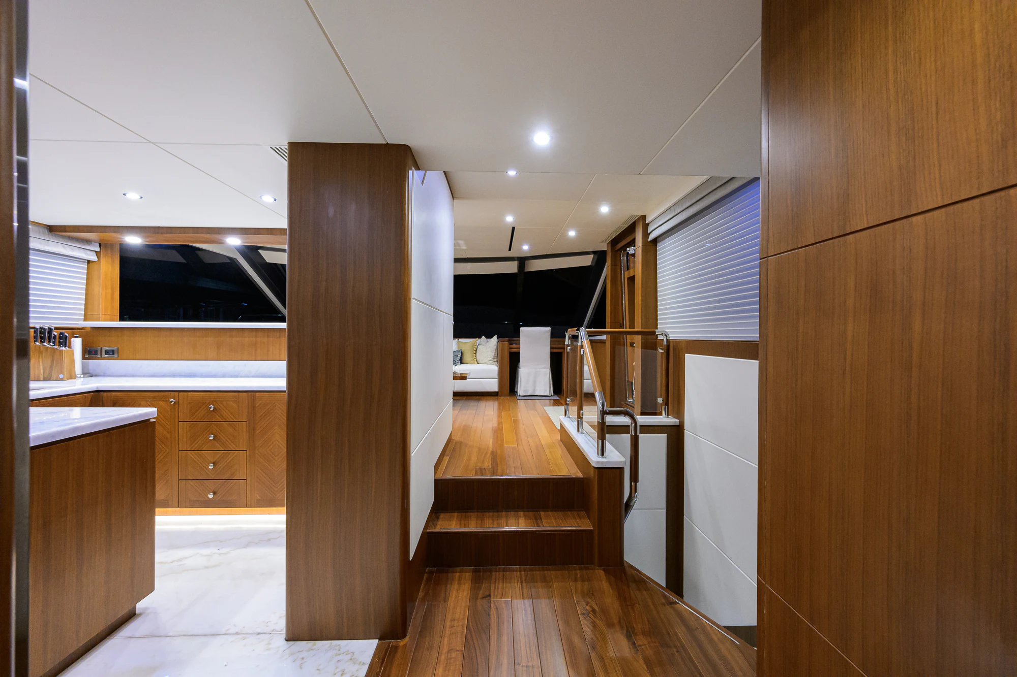 a room with wooden floors and a staircase aboard CHINDON Yacht for Sale