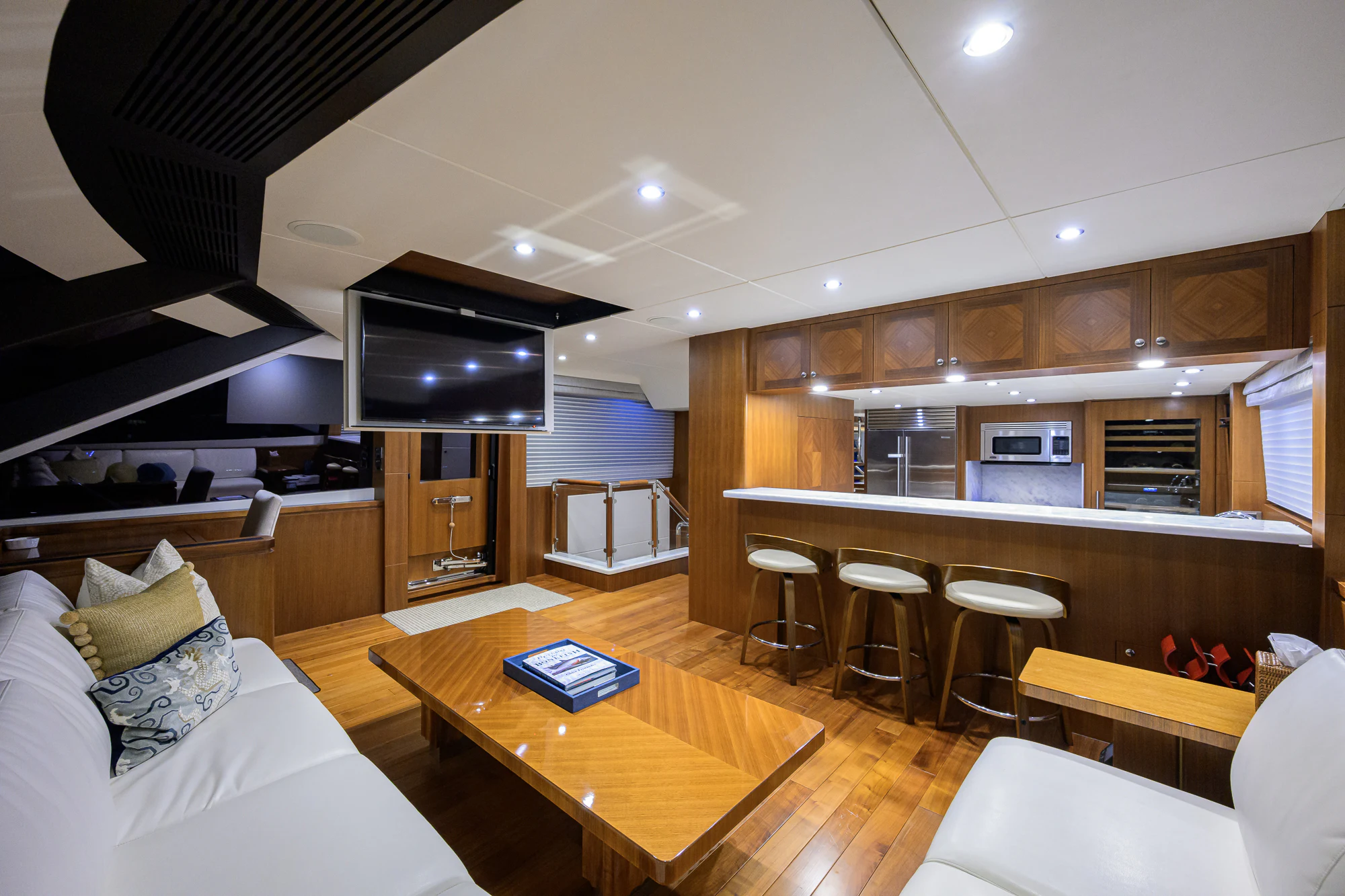 a room with a bed and a table aboard CHINDON Yacht for Sale
