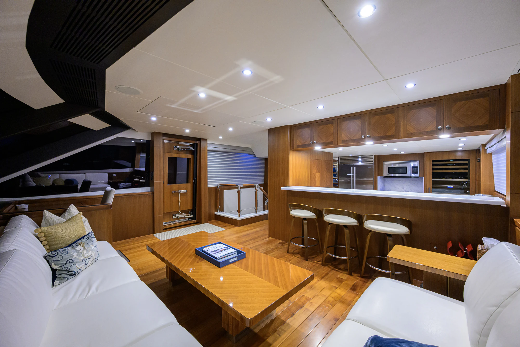 a room with a couch and a table aboard CHINDON Yacht for Sale