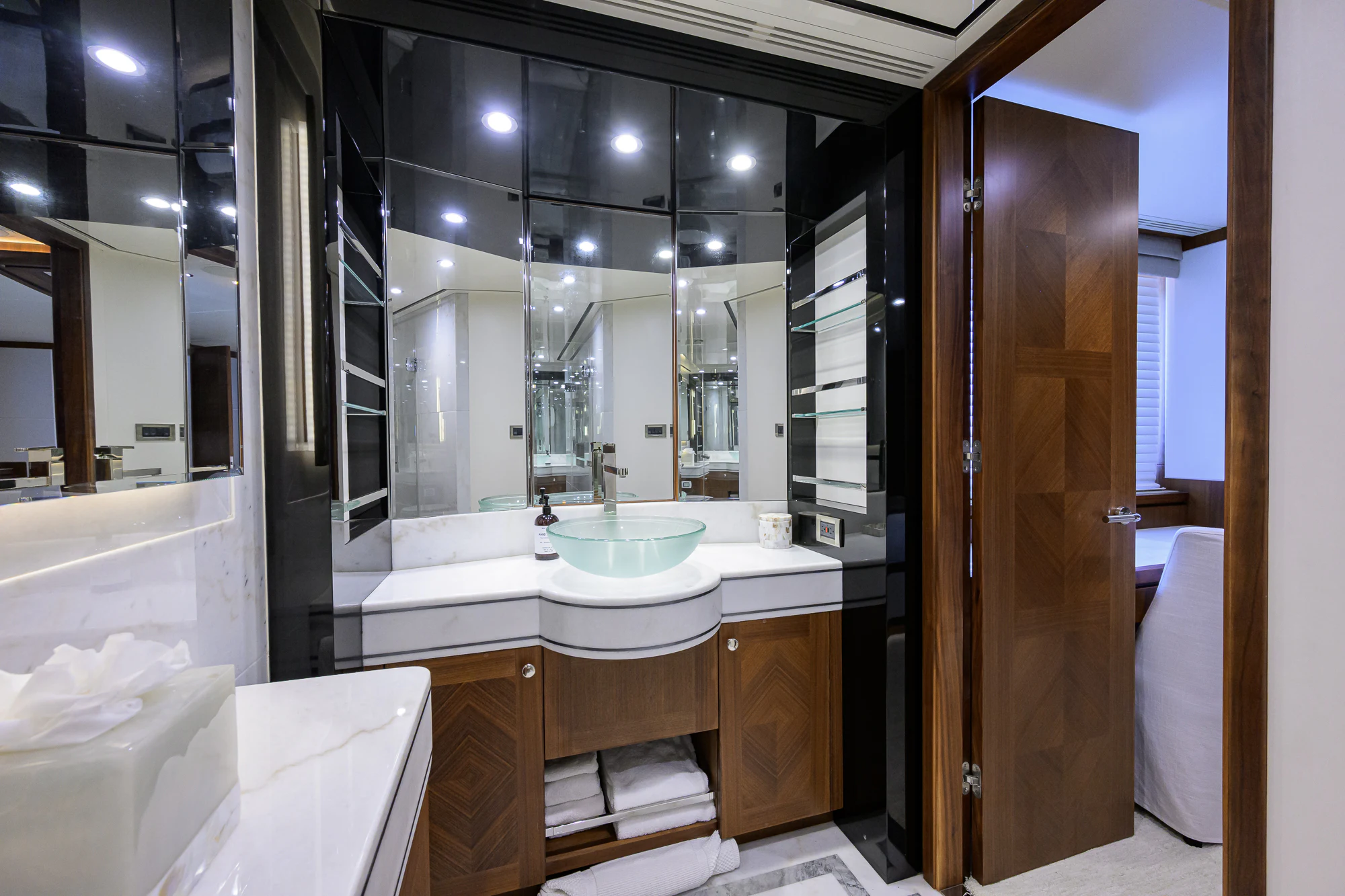 a bathroom with a sink and a bathtub aboard CHINDON Yacht for Sale