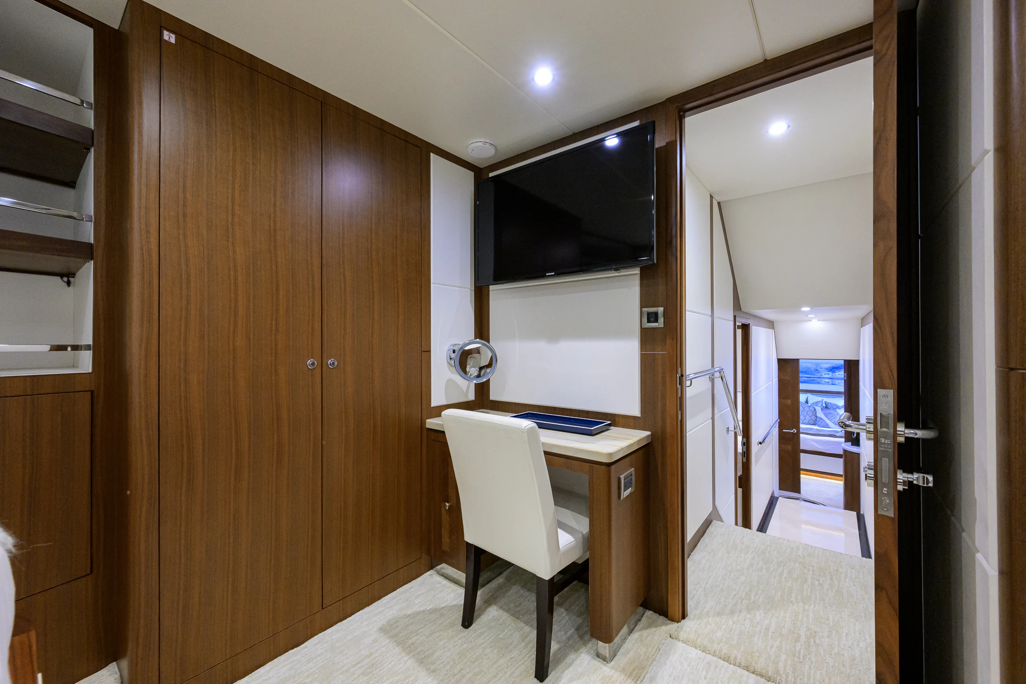 a room with a desk and a chair aboard CHINDON Yacht for Sale
