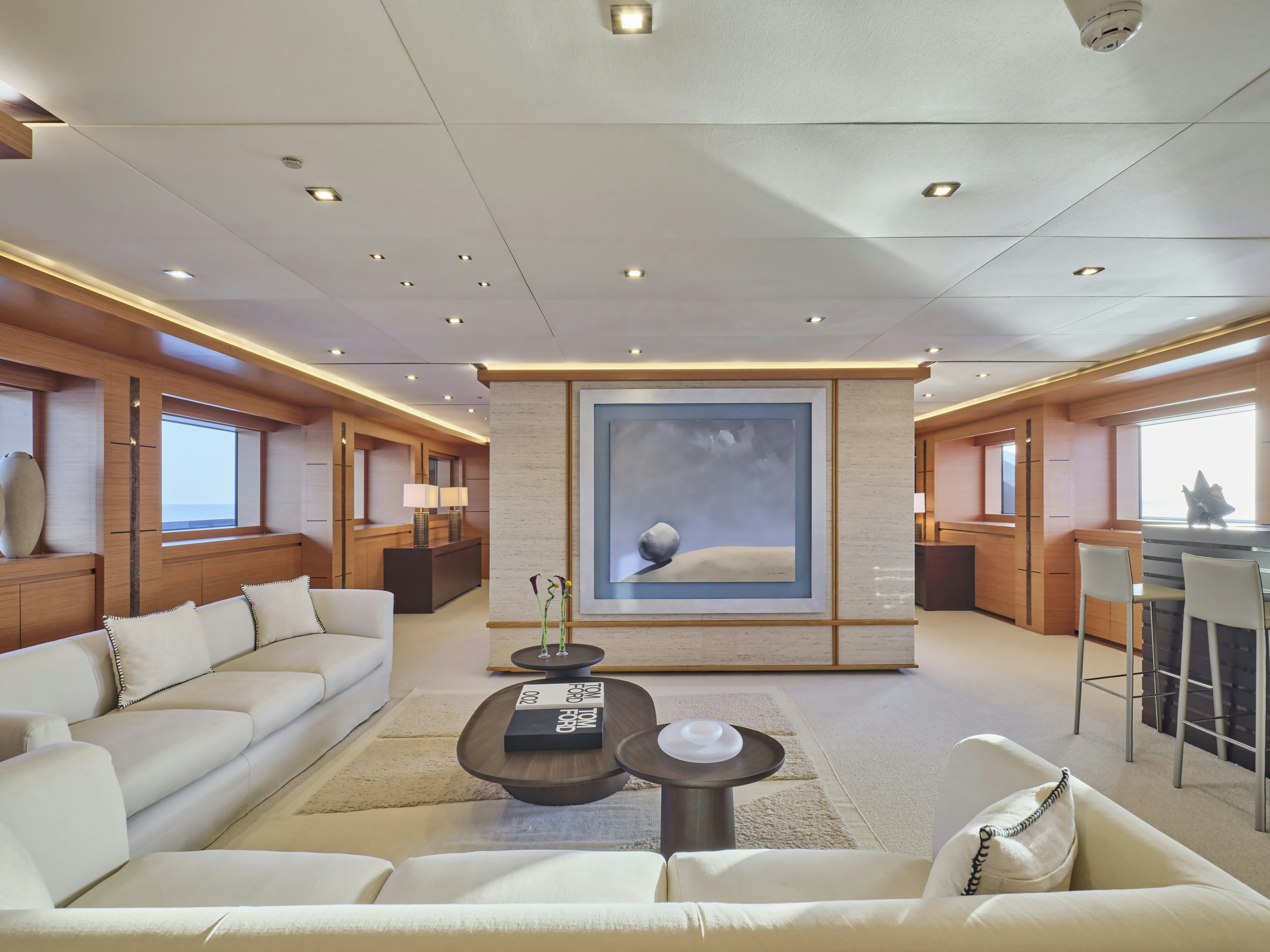a living room with a fireplace aboard PERSEFONI I Yacht for Charter