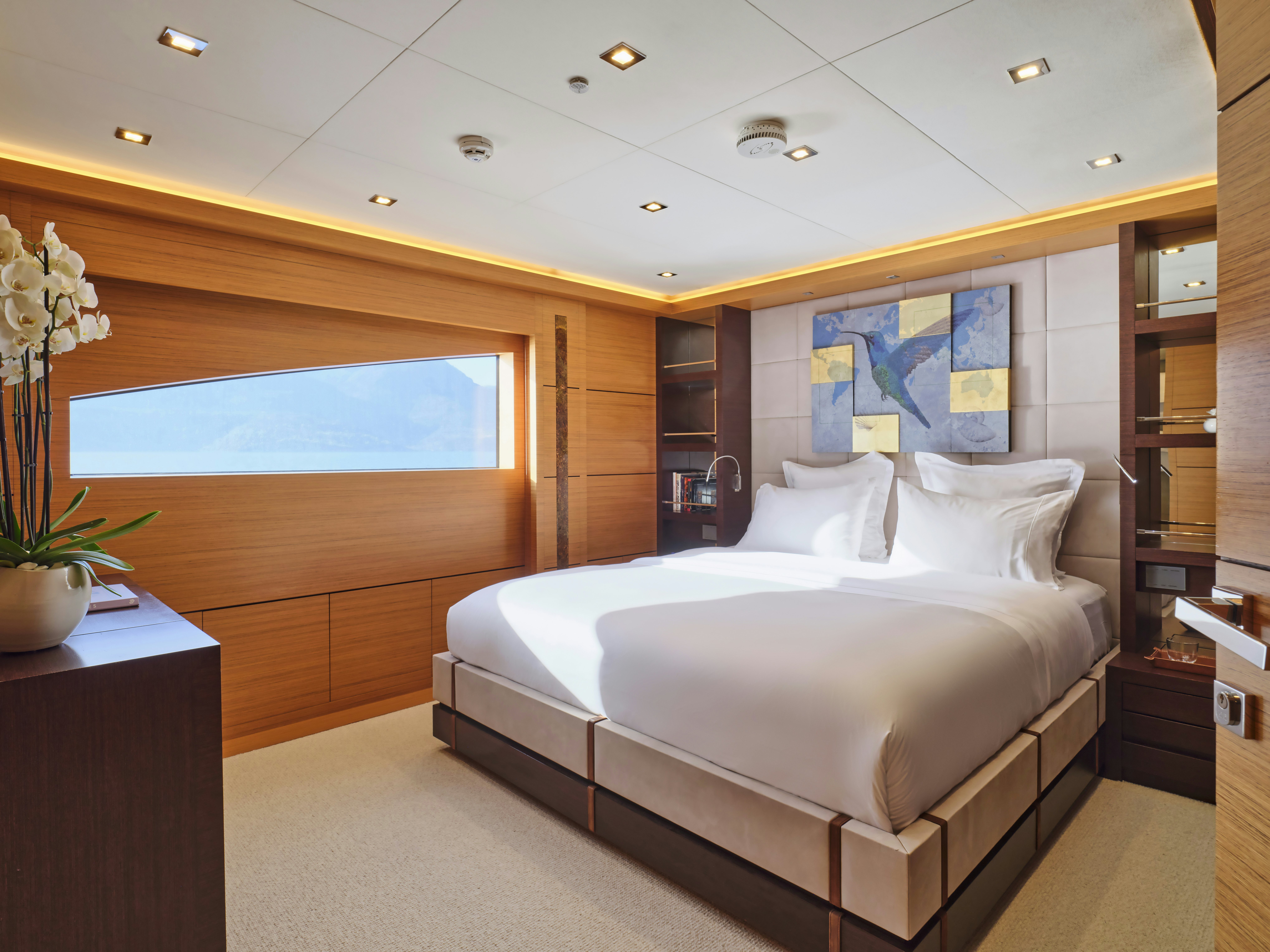 a large bed in a room aboard PERSEFONI I Yacht for Charter